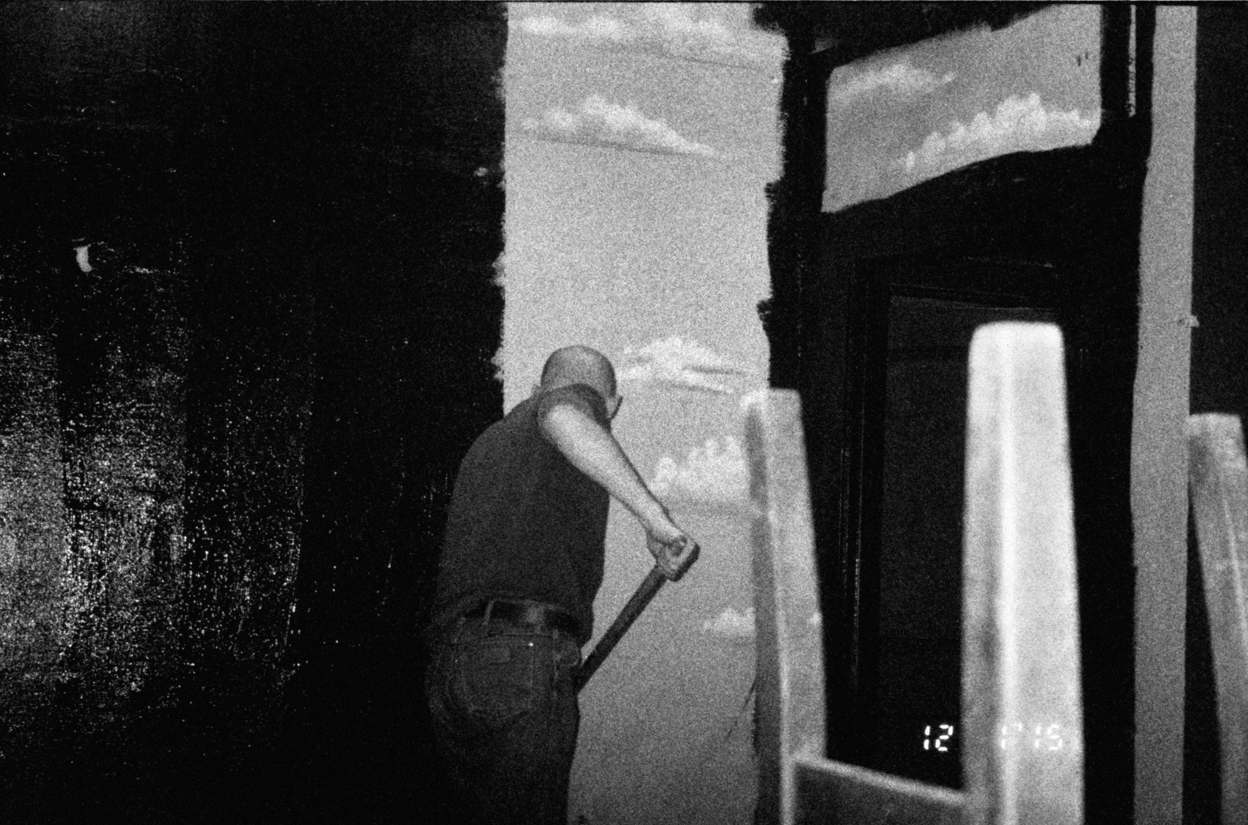  Artist and Scenic Designer, Justin Hunter Allen painting over clouds on set at The Ochre House Theatre in 2011 