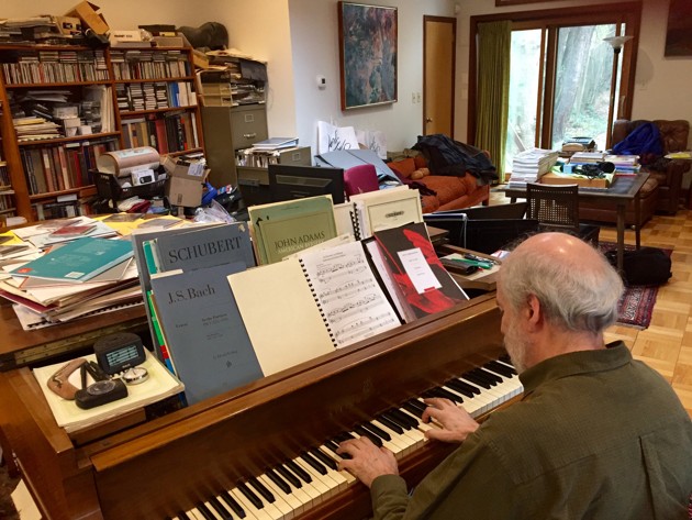 Haskell Small at his piano. Photo by Matthew Schwartz / WAMU.