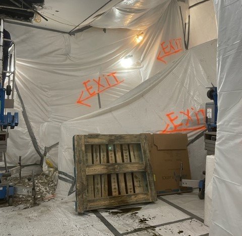 Penn Station, NY, interior of asbestos abatement work area.JPG