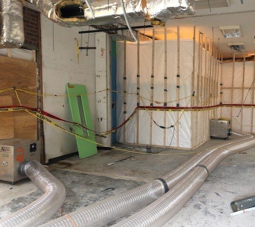 asbestos abatement containment with microtraps, flexible exhausts.JPG