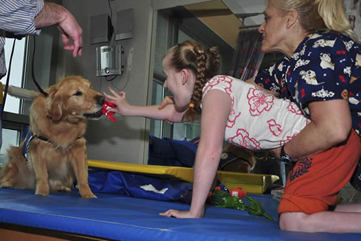 Billy works with Anna in therapy at Advocate's Pediatric Outpatient Therapy program. (Photo courtesy of Joy Schmoll)