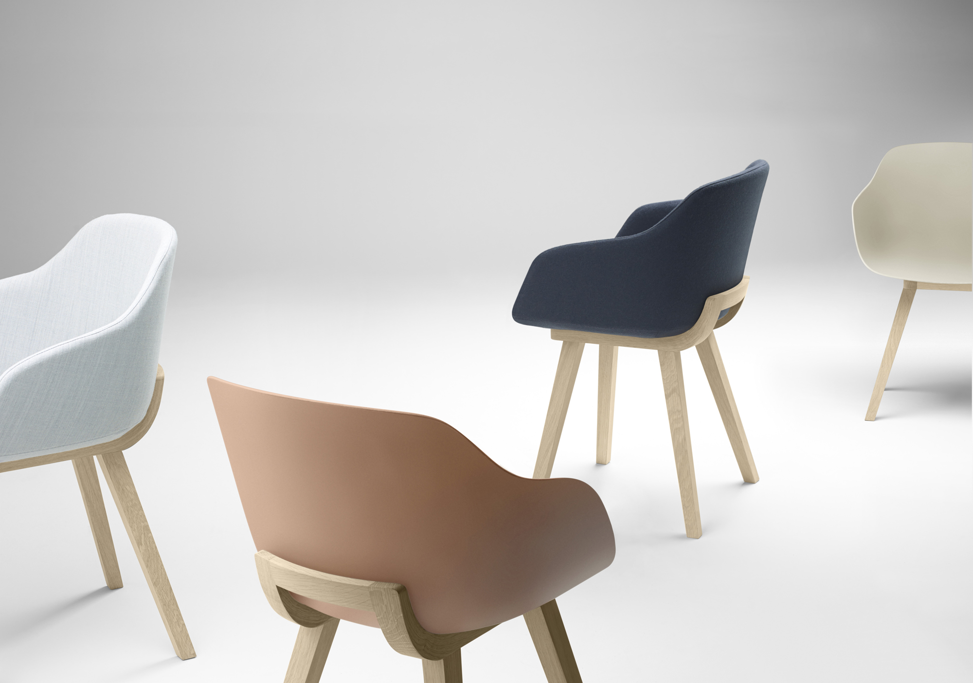 4 of 4 | Kuskoa Bi chair shown in a bioplastic or with the seat and/or inside back fully upholstered with oak legs