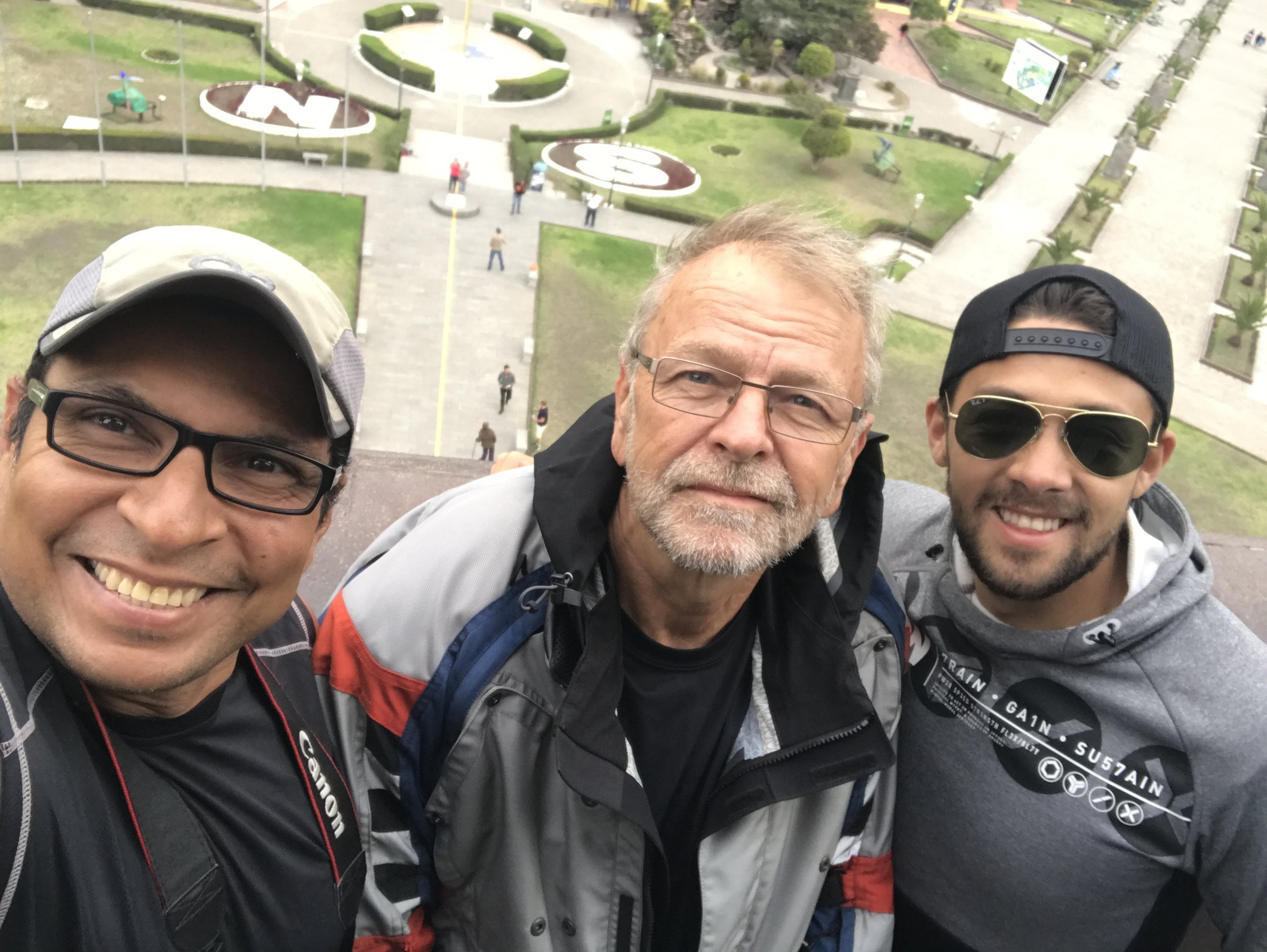 Omar and I along with James, our Airbnb host, at the "Mitad del Mundo".