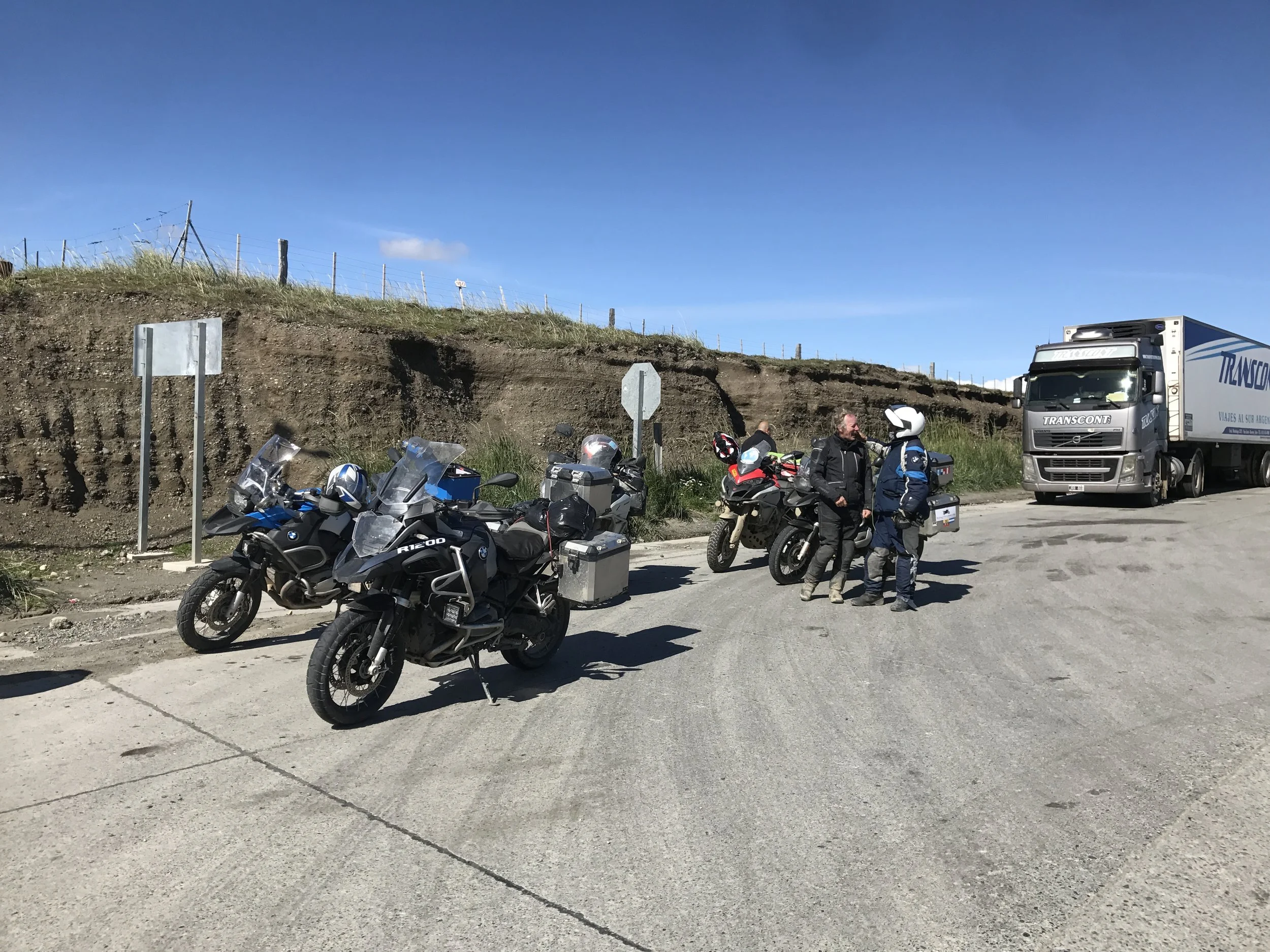Two farmers from different continents meeting at the ramp, one from Argentina and one from the UK.