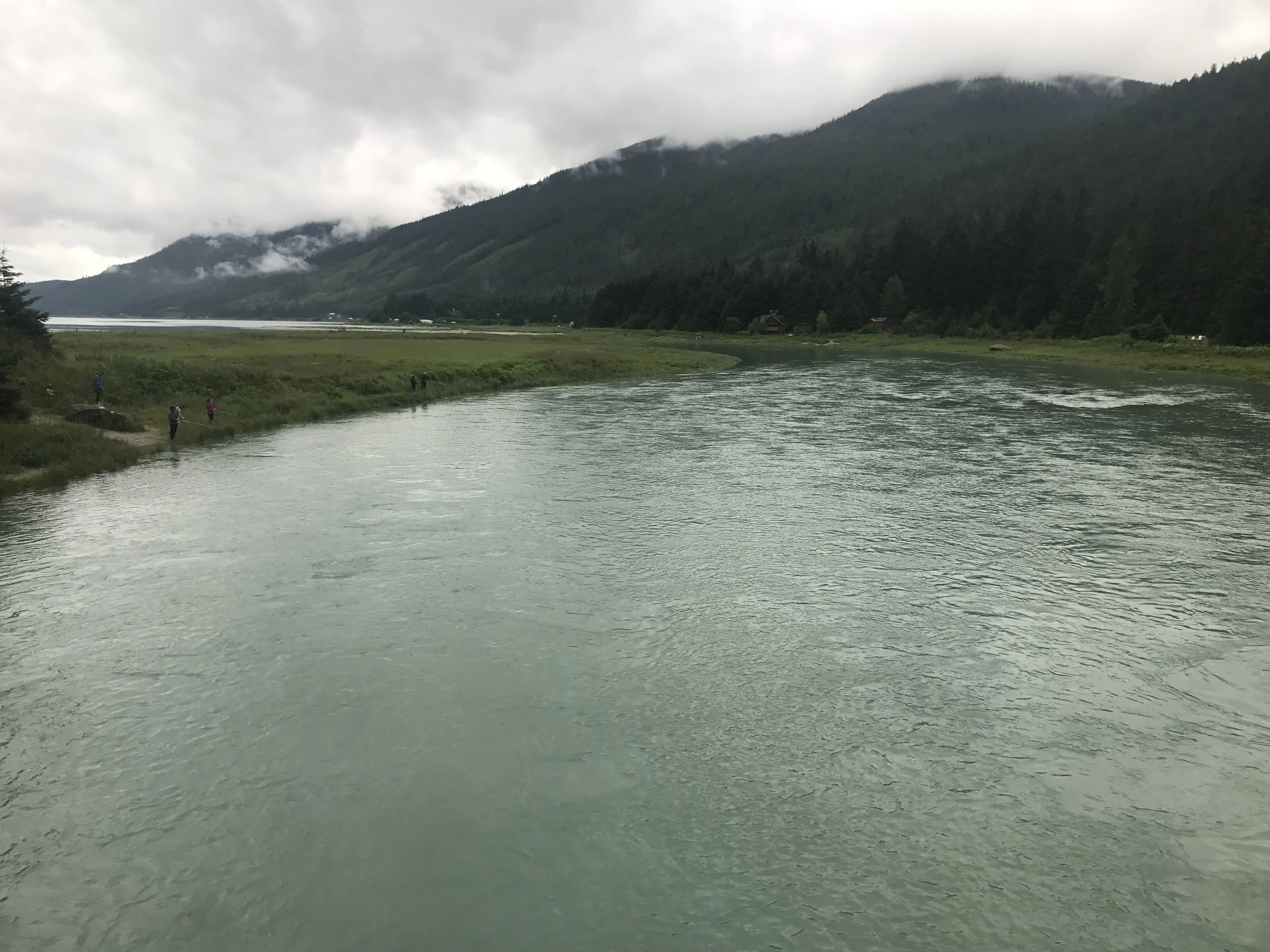 River as it flows into the inlet to the ocean. 