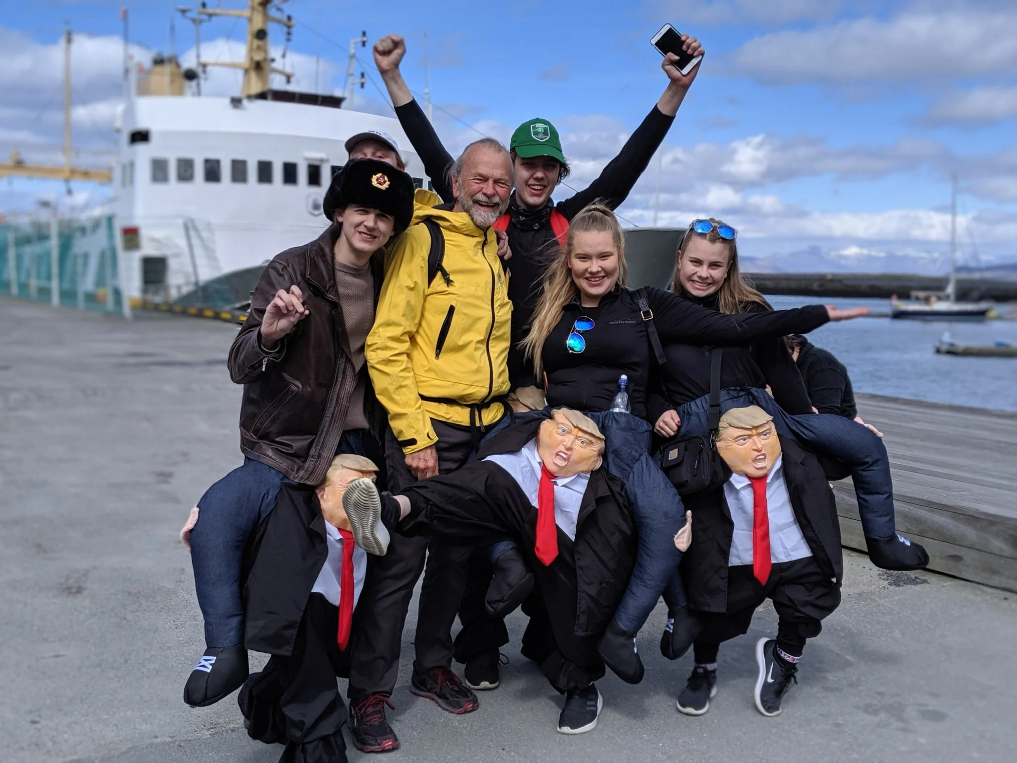 On their last day of high school students go around town dressed in costumes, drinking, smoking and generally making mischief. This group attacked me down by the harbor.