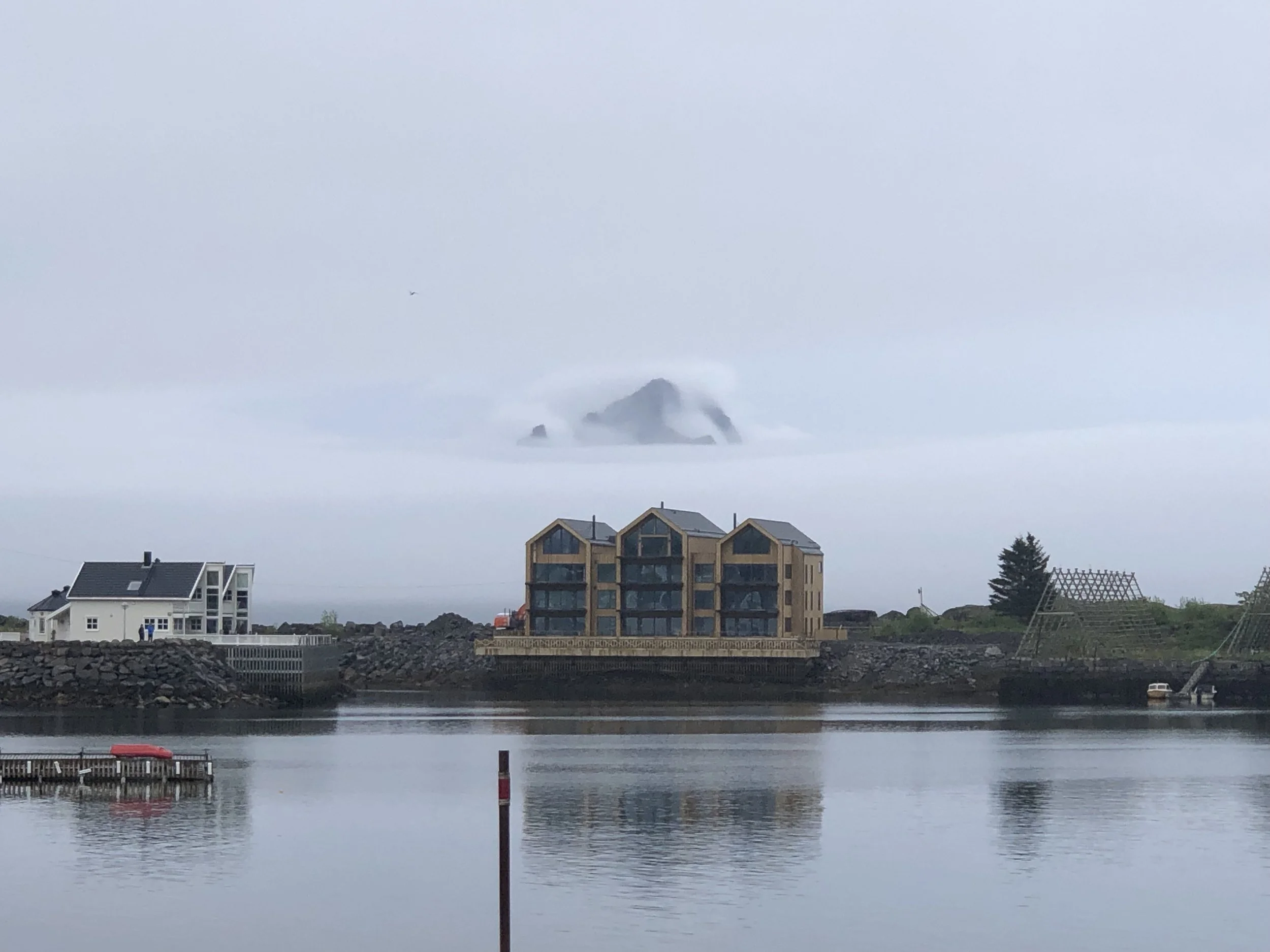 Foggy morning in Svolvaer with just the tips of the mountains showing in the distance.