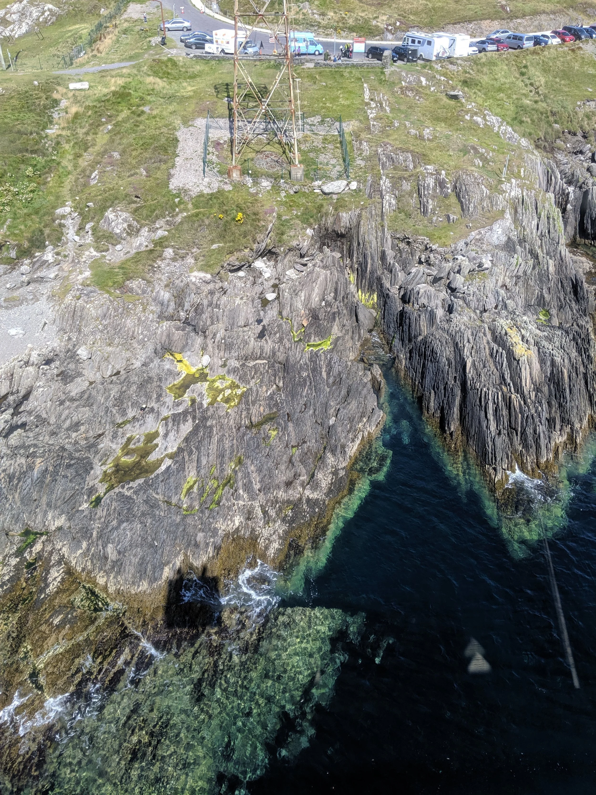 Below you can see the shadow of the tram car we used to cross a channel to visit a small island off the coast. The operator told us that in addition to transporting people they also use the tram to transport sheep to/from the island.