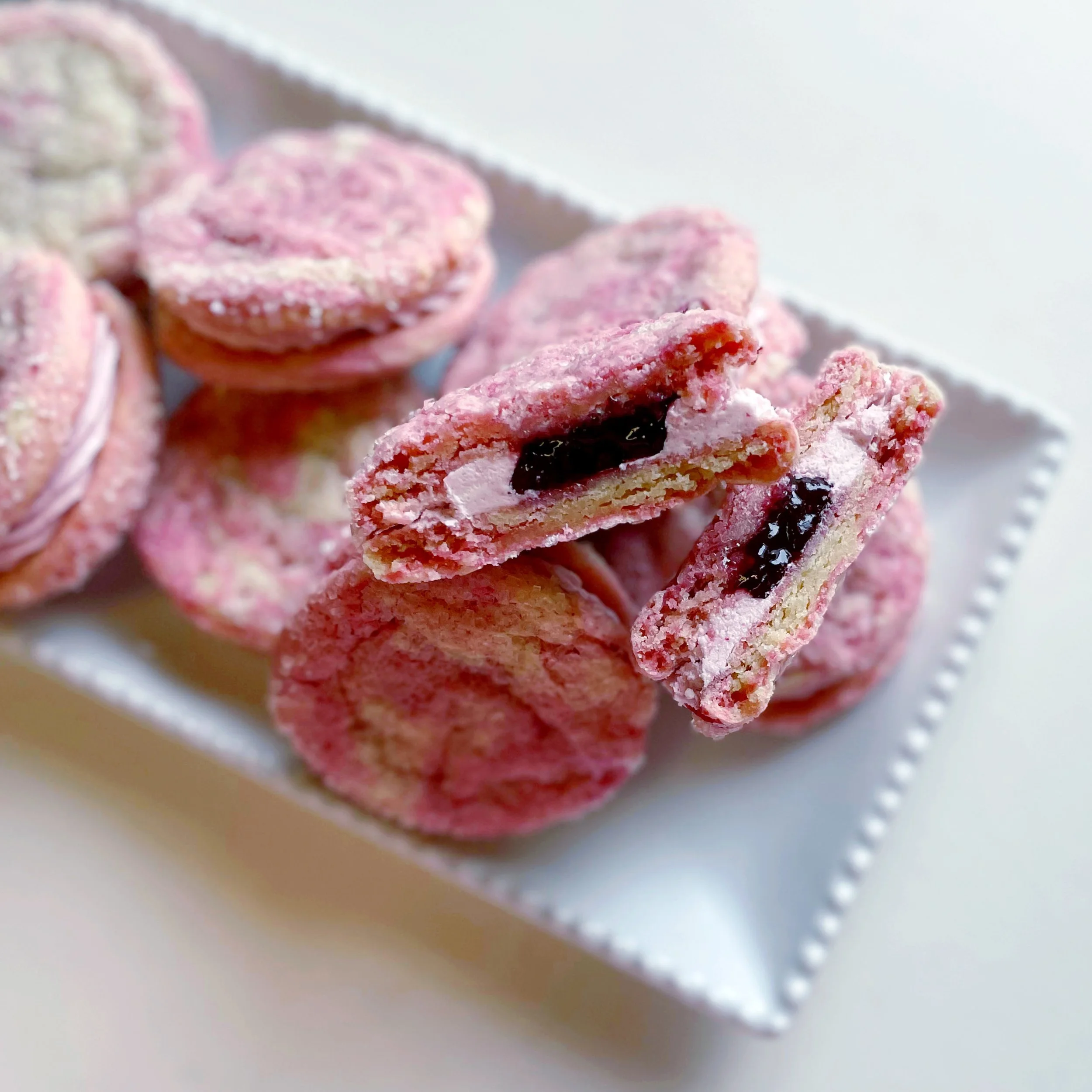  Raspberry Almond Cookie Sandwiches  $42 per dozen 