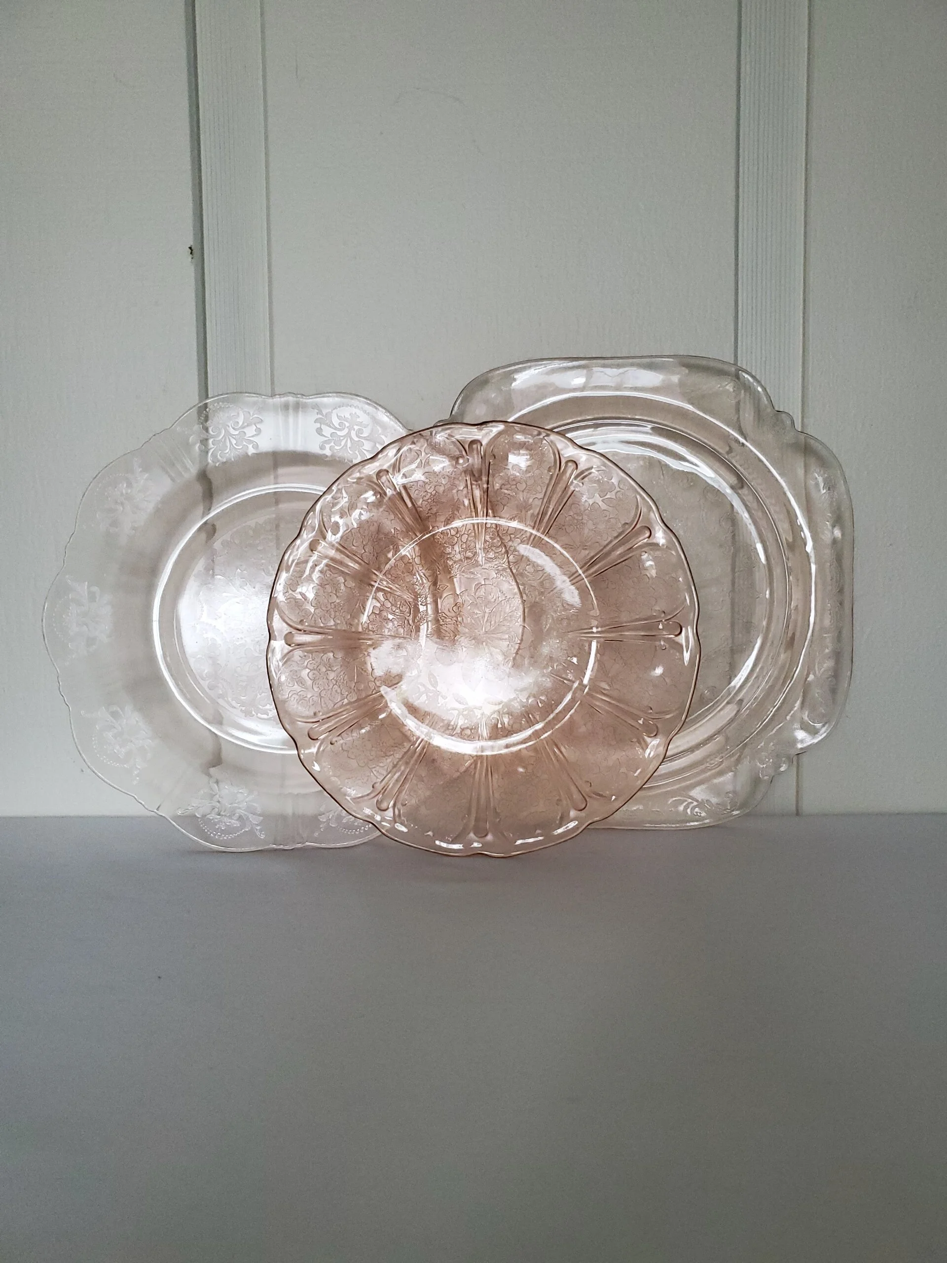 Pink glass plates from The Copper Quail