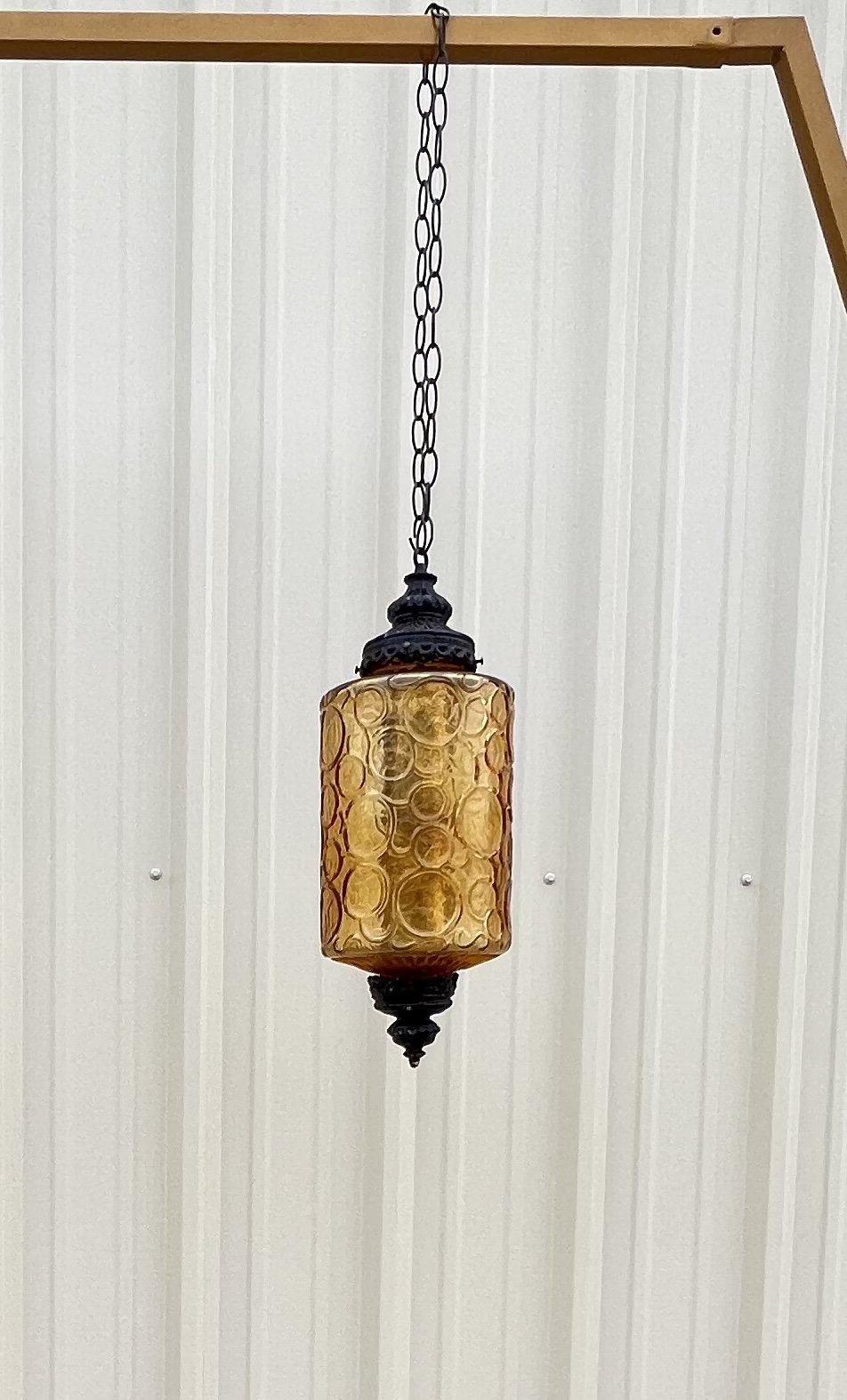 Amber hanging light from The Copper Quail