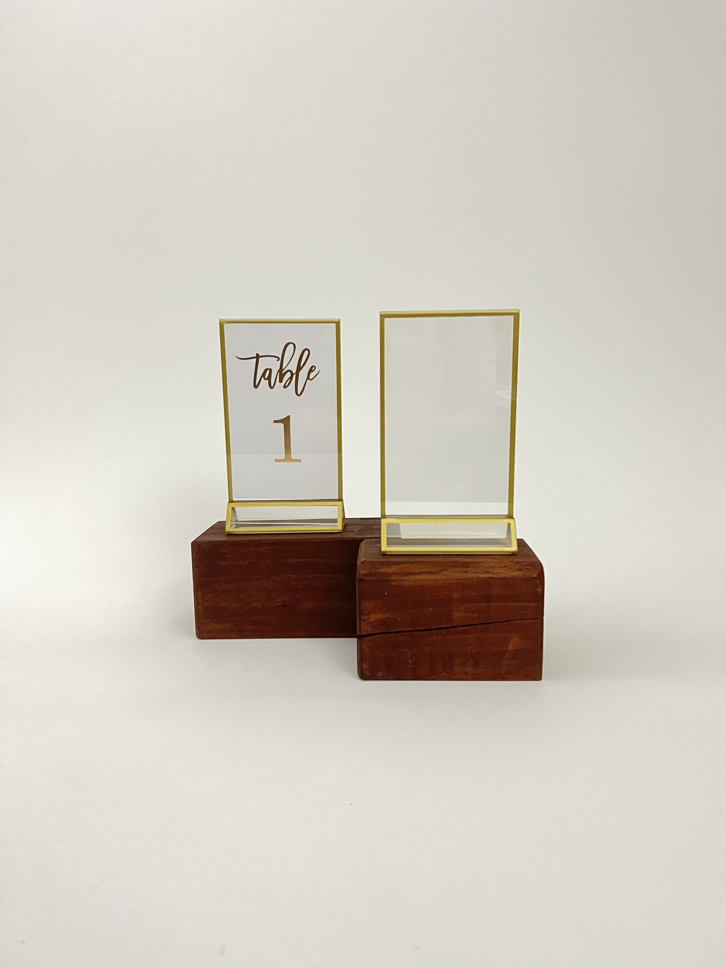 Gold Rimmed Table Number Displays from The Copper Quail
