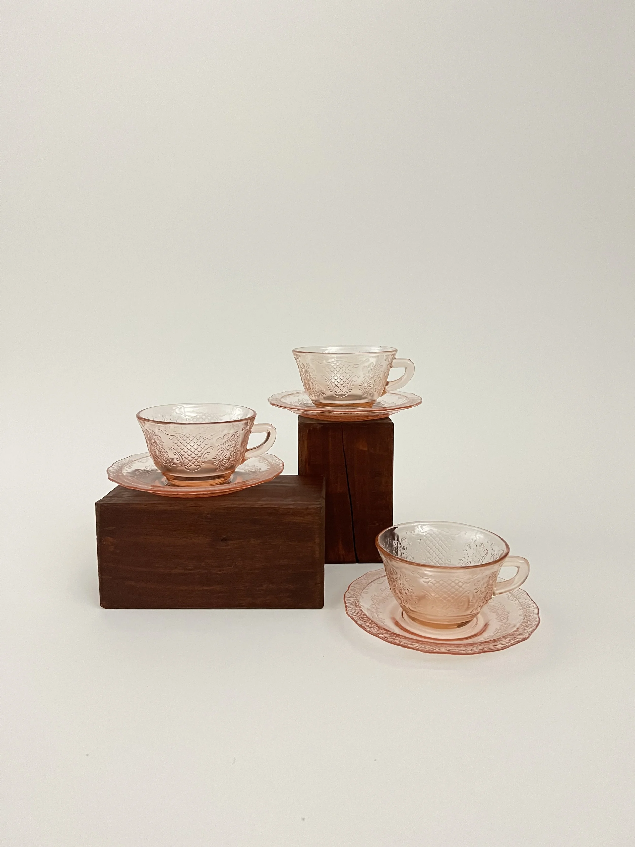 Pink Glass Teacups and Saucers from The Copper Quail