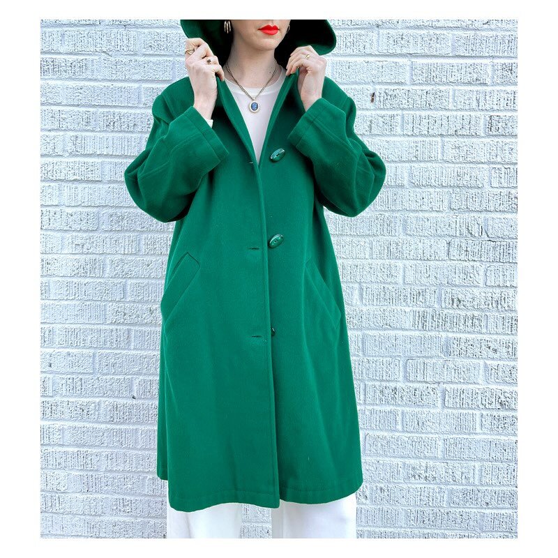 I swear we sell more than outerwear but just look at this classic hooded coat in 100% solid emerald wool 💚 Available online, in store or right here rn via venmo!