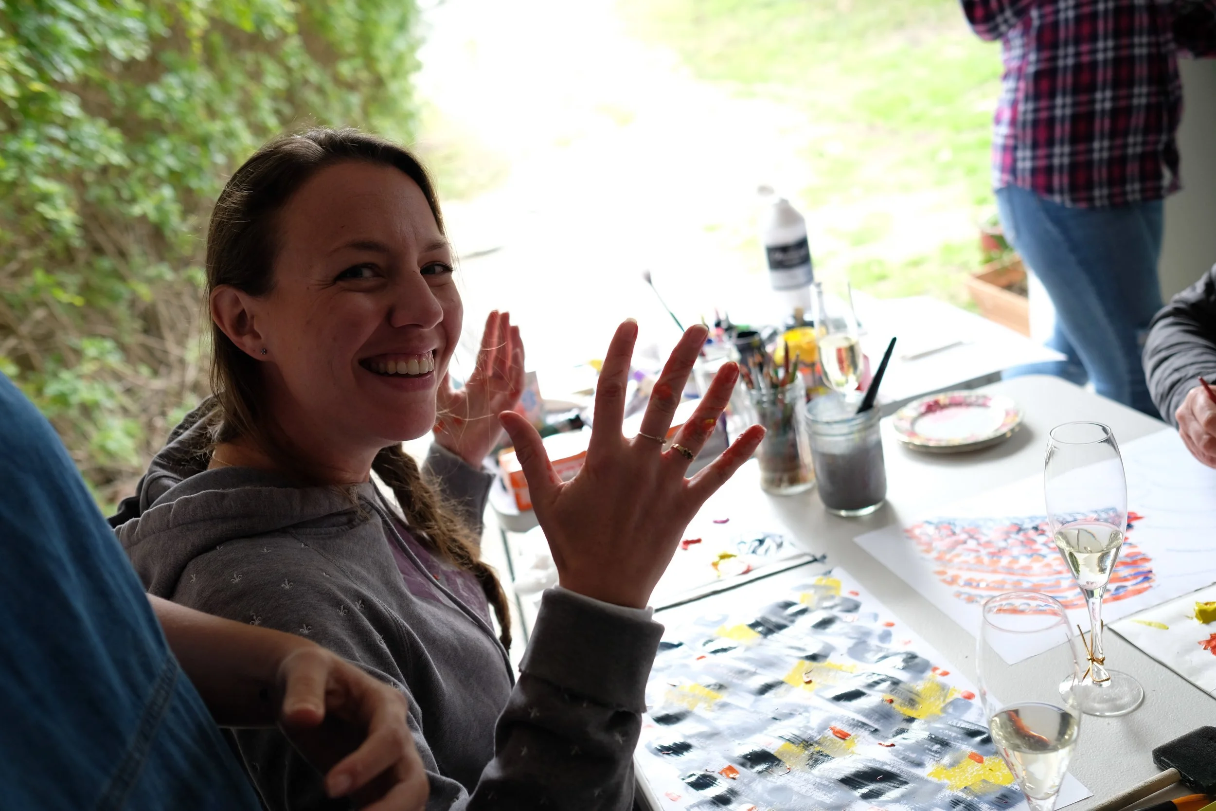 The naughty student getting paint splatters on everyone
