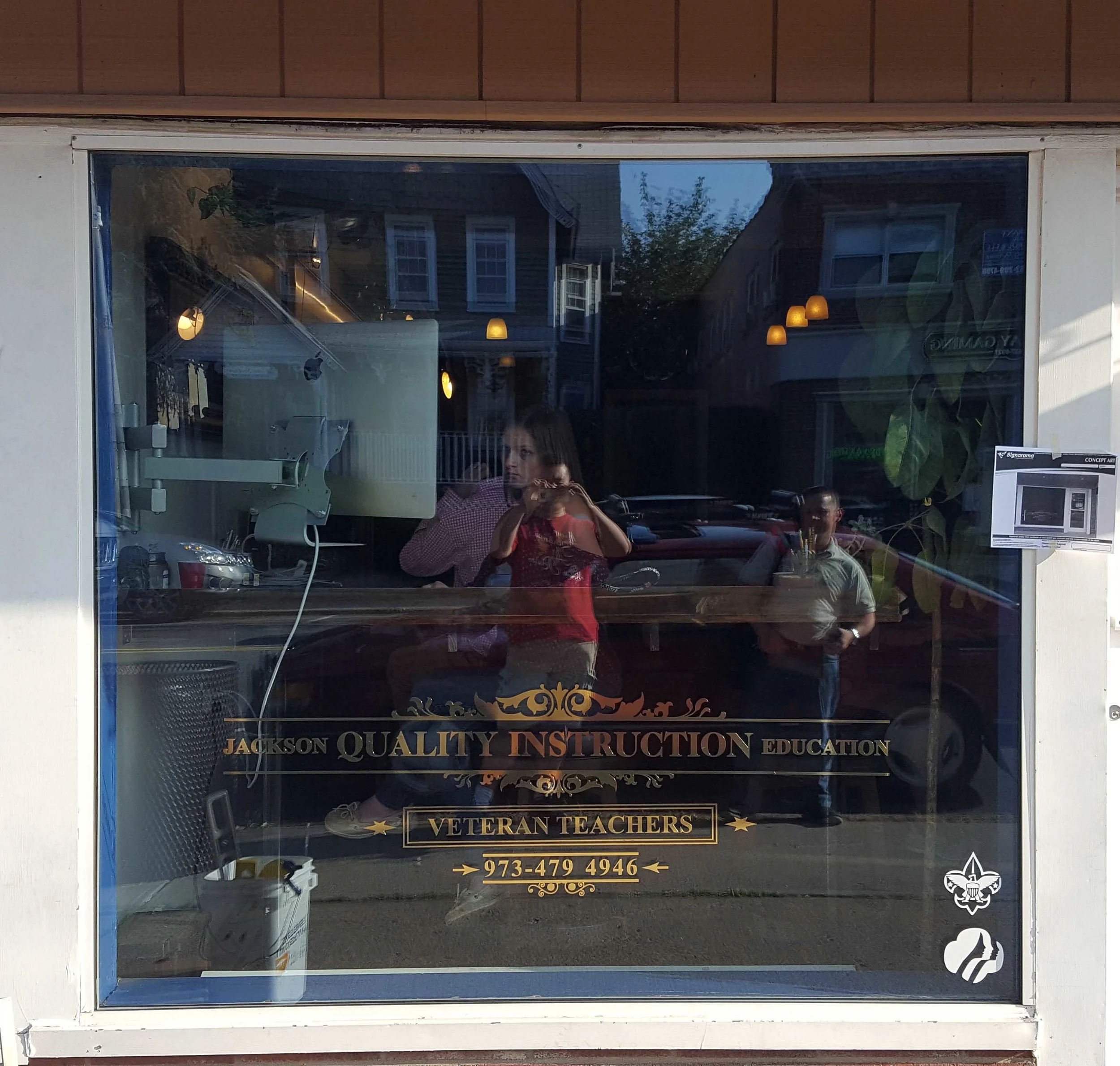 jackson glass window gold vinyl application.jpg