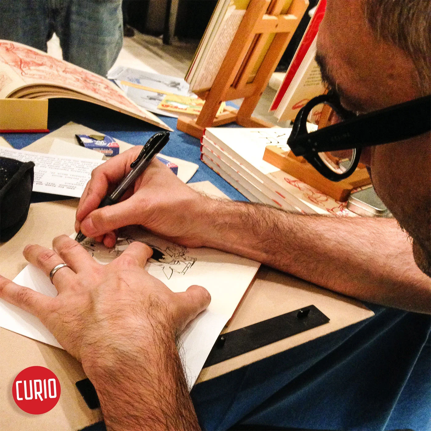 Cesare Asaro of Curio & Co. signing at IndiComics at Wien Museum in 2017