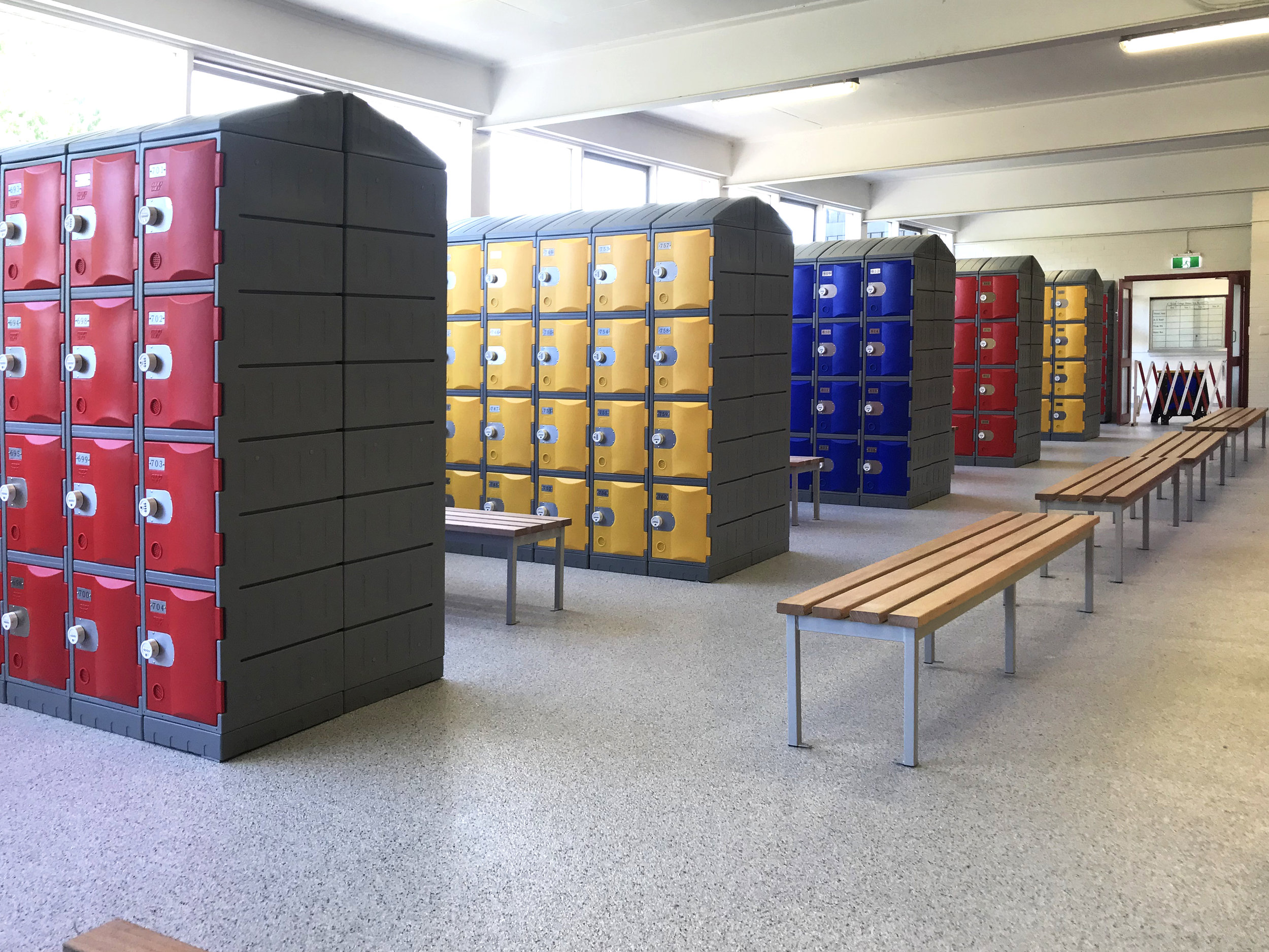 Red, yellow and blue heavy duty plastic lockers.
