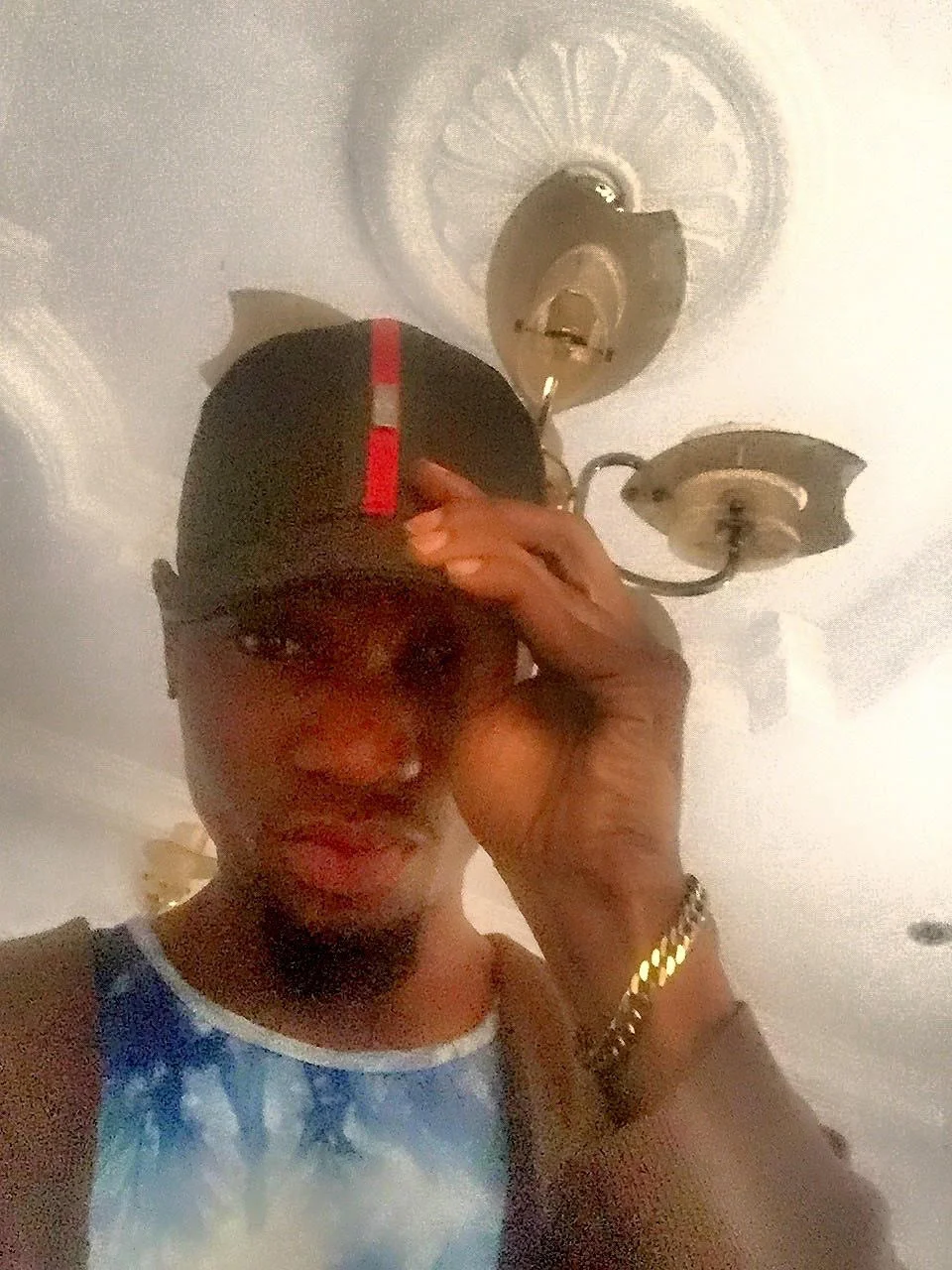 6coJohn mixed patterns and prints on this selfie. He did a great spin with the Gold accent of the bracelet & RED Stripe in the Dad Hat (Gucci).