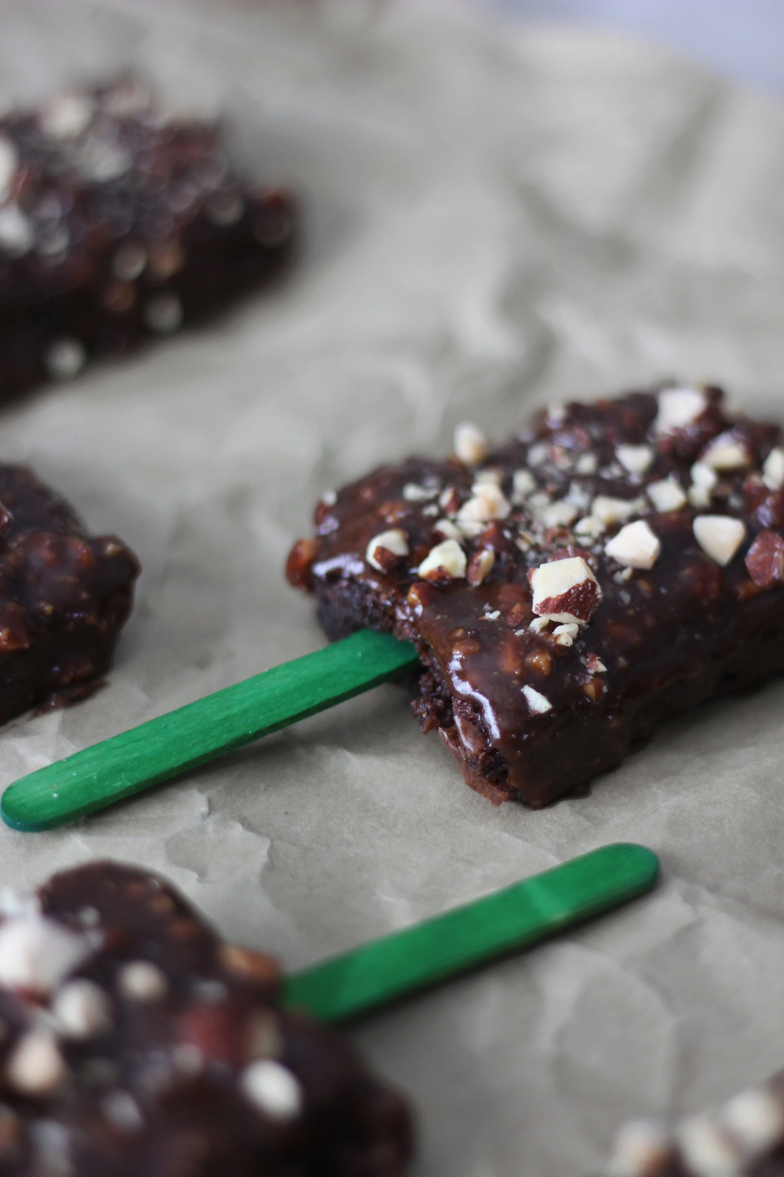 Reese's Peanut Butter Cups and Almond Covered Brownie Popsicles