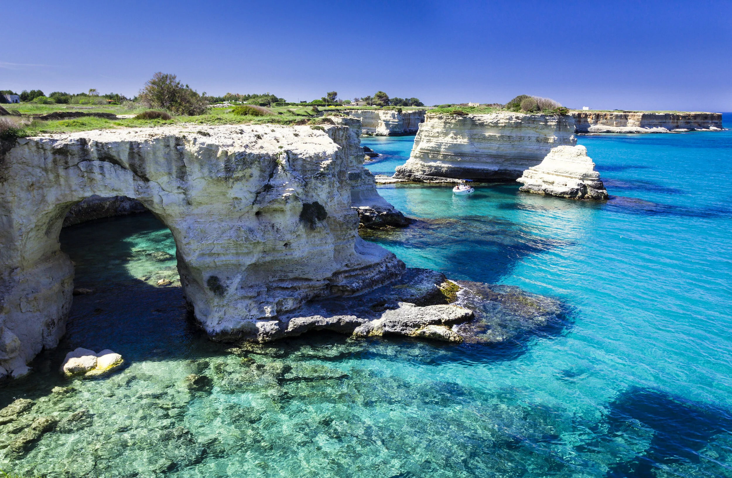 picfair-07667511-turquoise-waters-of-sant-andrea-salento-italy.jpg