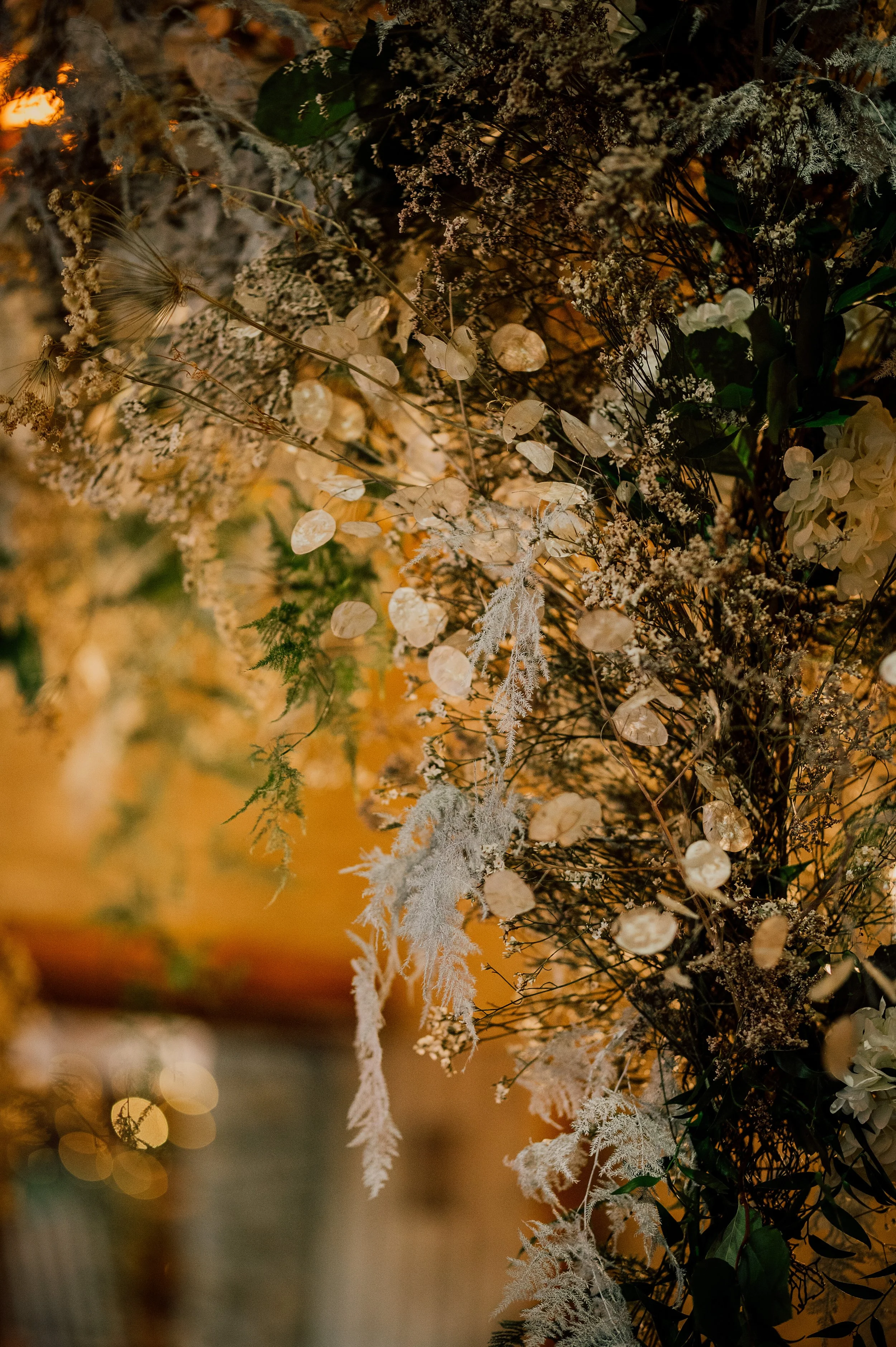 Winter flower arch with chandelier and flower meadows