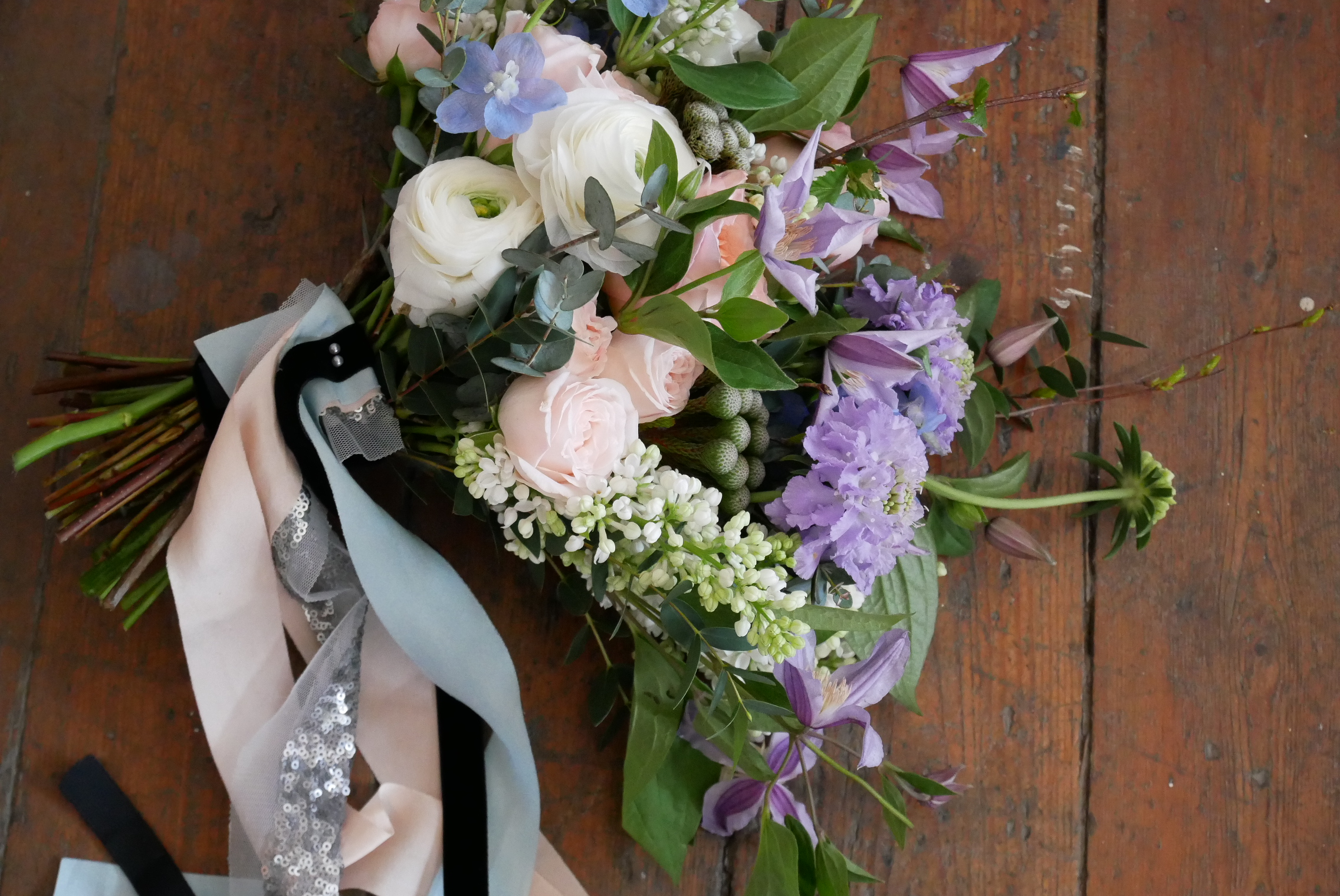 Preparing the bouquet for shooting. Just love the silk ribbons mixed with black velvet and silver sequins. 