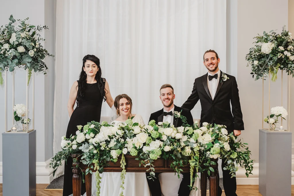Elegant green and white wedding at Rushton Hall. Flowers by The Flower Story