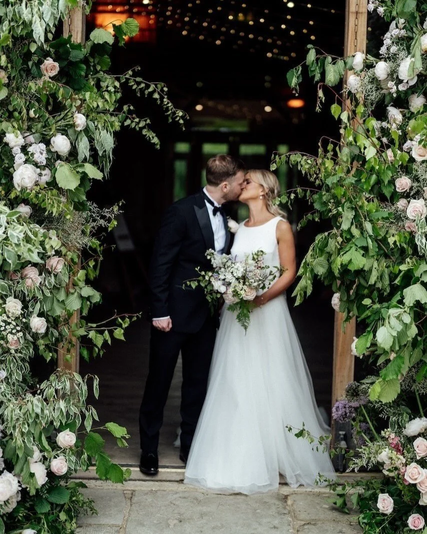 A grand entrance, framed with roses and peonies. We adored creating these flower columns for L&amp;J to line the doorway and set the tone for a truly unforgettable wedding day. Every petal, every detail, designed to create a statement.
⠀⠀⠀⠀⠀⠀⠀⠀⠀
Venu