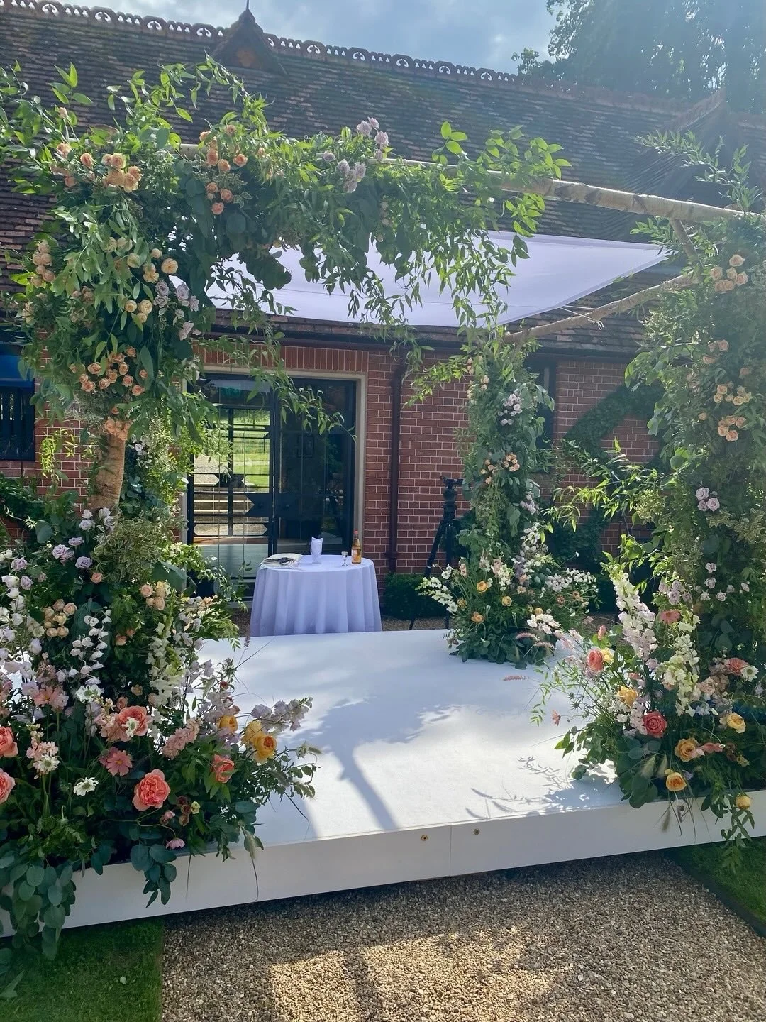 On one of the coldest days for a while it only seems right to bring a bit of warmth to the grid. A whimsical garden style flower-filled Chuppah basking in the sunshine for H&amp;B at Waddesdon Manor (it was a very hot summery day!). And for the recep