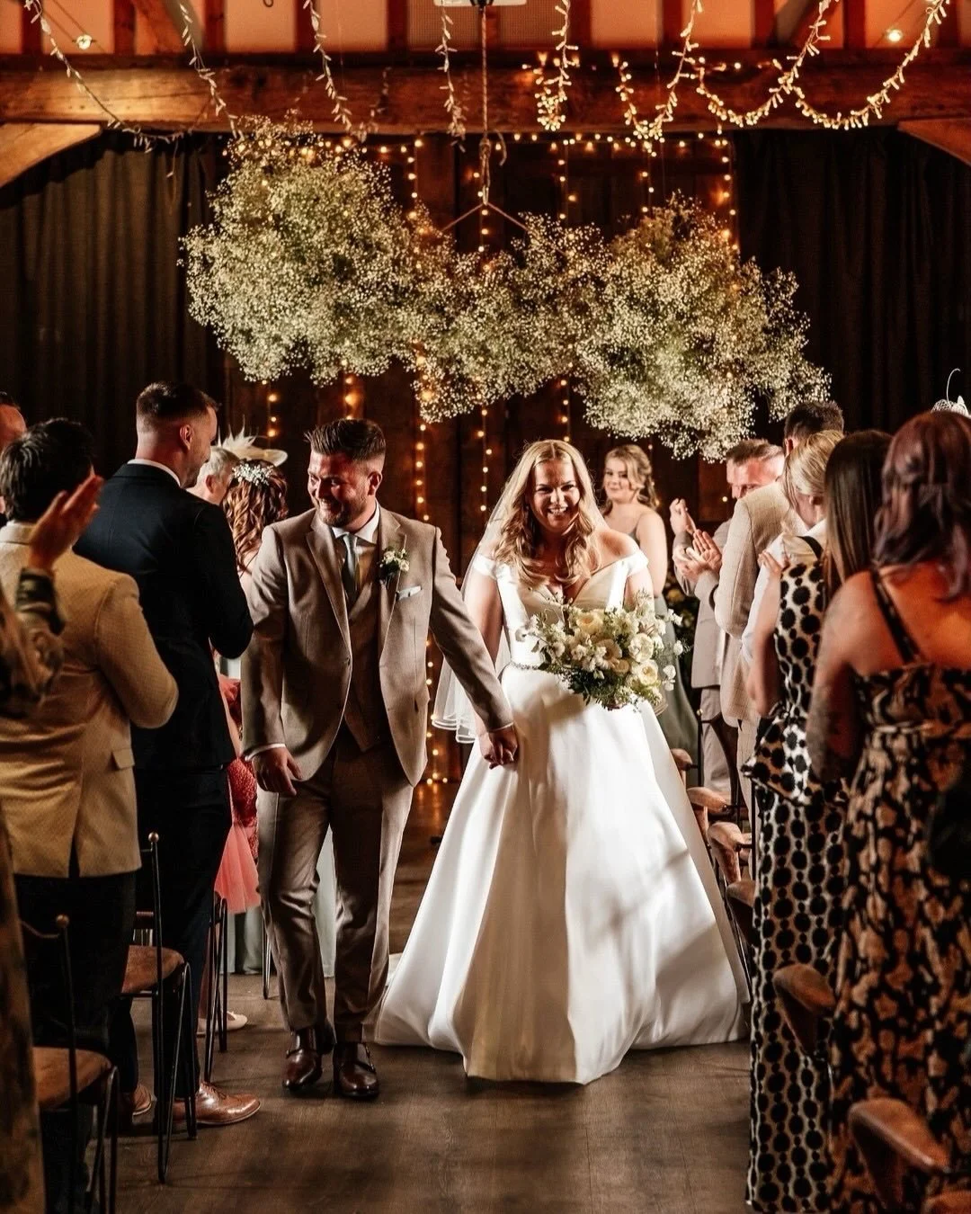 A beautiful moment beneath a fluffy cloud of gypsophila. We loved creating this dreamy floral installation for B&amp;G, such a special wedding.
⠀⠀⠀⠀⠀⠀⠀⠀⠀
Photographer: @aniaamesphotography 
Venue: @tythebarnlaunton