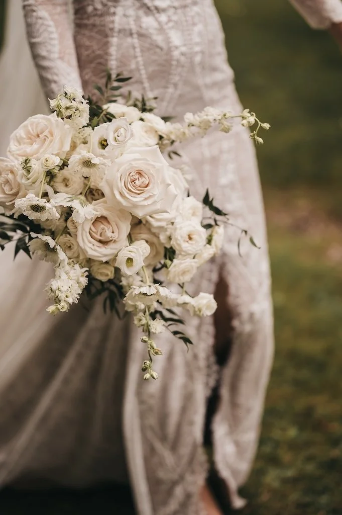 Full luxury wedding bouquet with neutral and white flowers