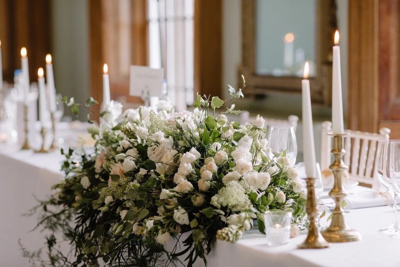 Garden style top table wedding flower arrangement at Kelmarsh Hall by The Flower Story