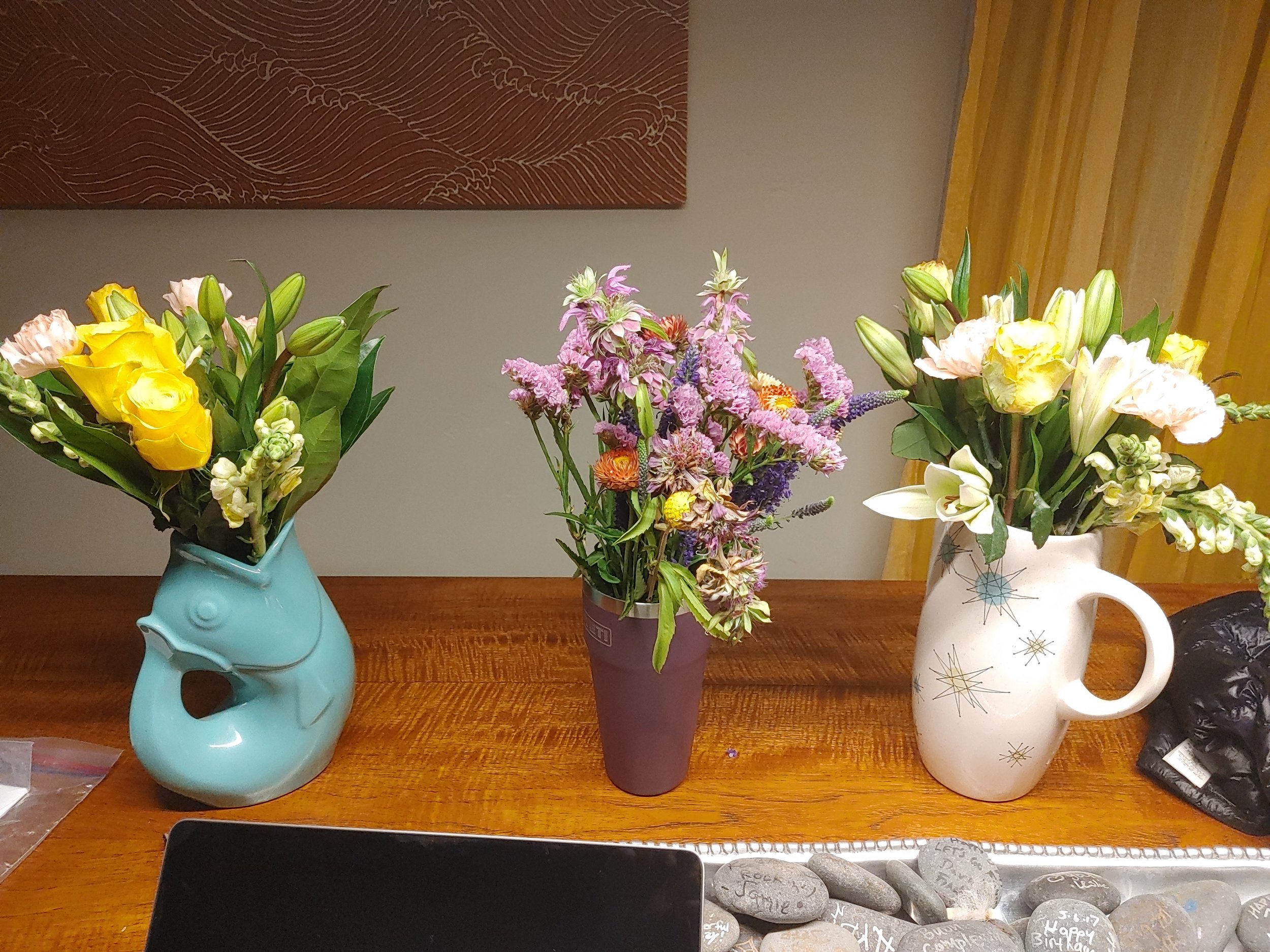  Middle flowers from Rand. Side flowers from Josephine. Love you guys!   Makeshift vases I found around the house.  :) 