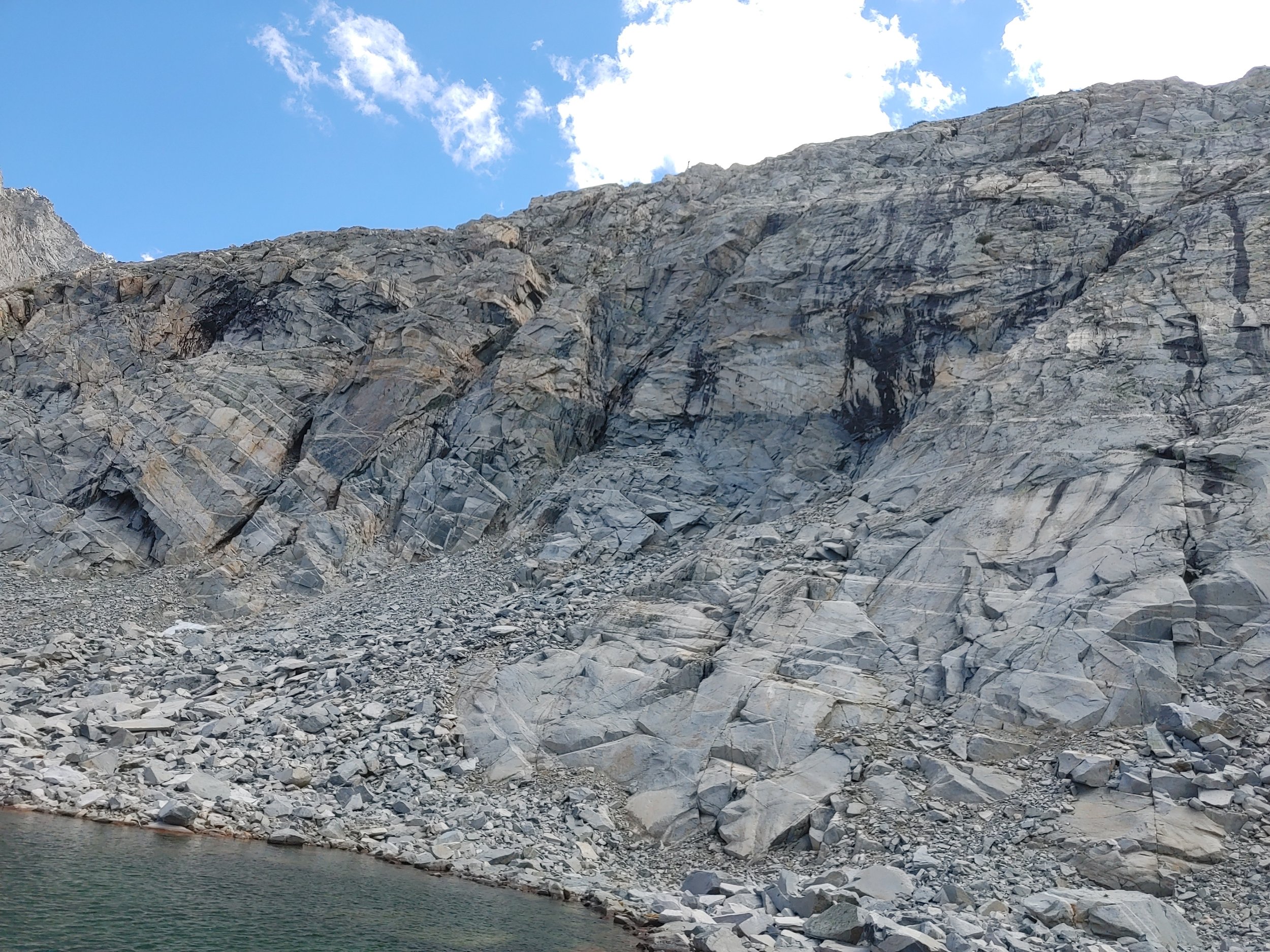  Look at the horizontal striations carrying across the entire face of the rock!   Can’t really continue in this direction to make it back to the main trail, so time to turn around and then head back down… 