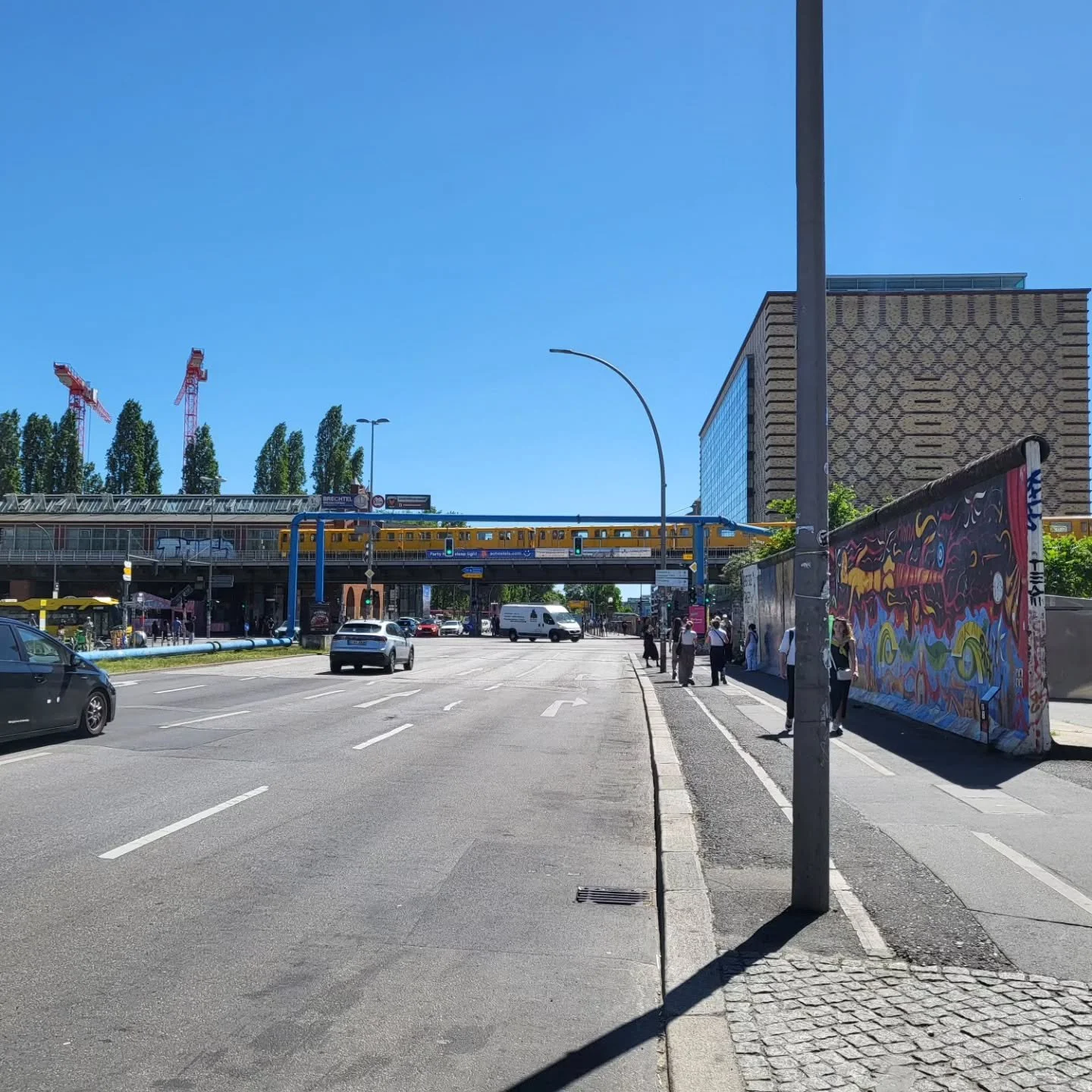Urban planning and interiors in Berlin. No shying away from combining physical &amp; political history with infrastructure and the brand new with so many green spaces and tree lined roads. A city largely rebuilt from WWII and a metamorphosis since 19