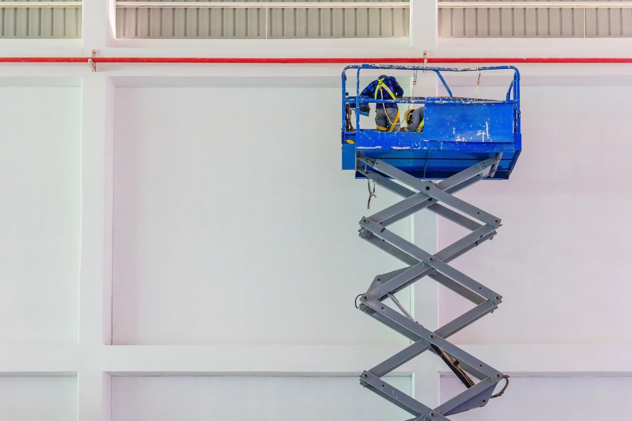 Finest Touch Exterior Painting Scissor Lift.jpeg