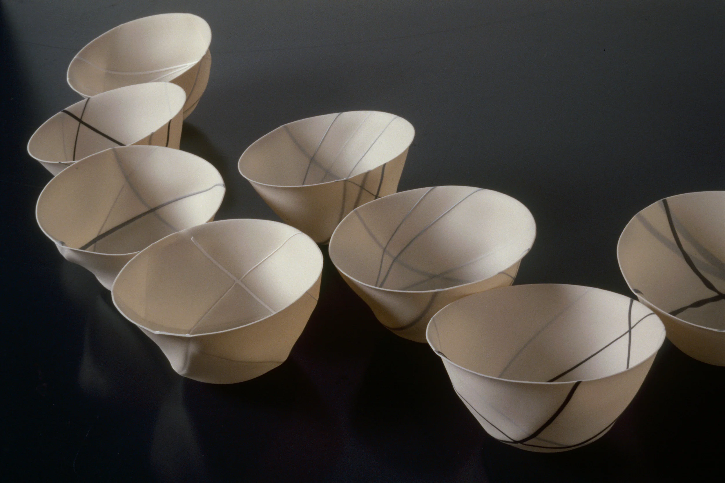 RANDOM LINE SPUN PORCELAIN VESSELS SMALL BONE CHINA IN - OUT PHOTO: GRAHAM MURRELL