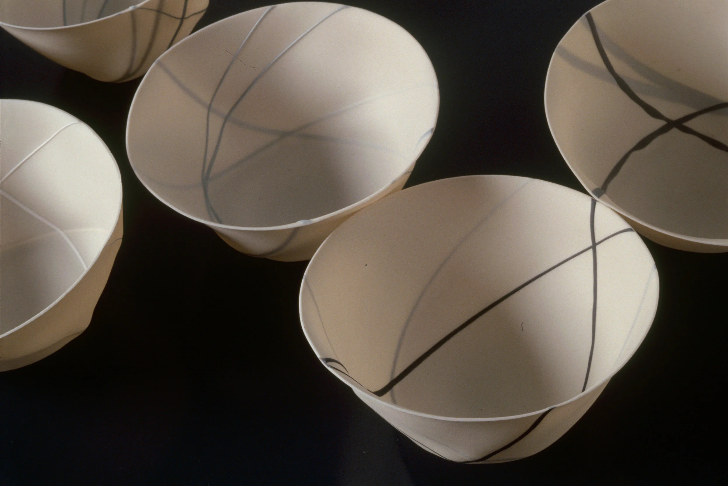 RANDOM LINE SPUN PORCELAIN VESSELS SMALL BONE CHINA BLACK-GREY-WHITE PHOTO: GRAHAM MURRELL
