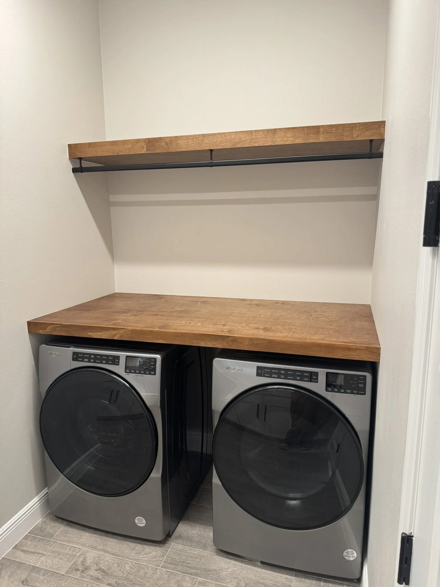 Laundry room butcher-block counter and floating shelves