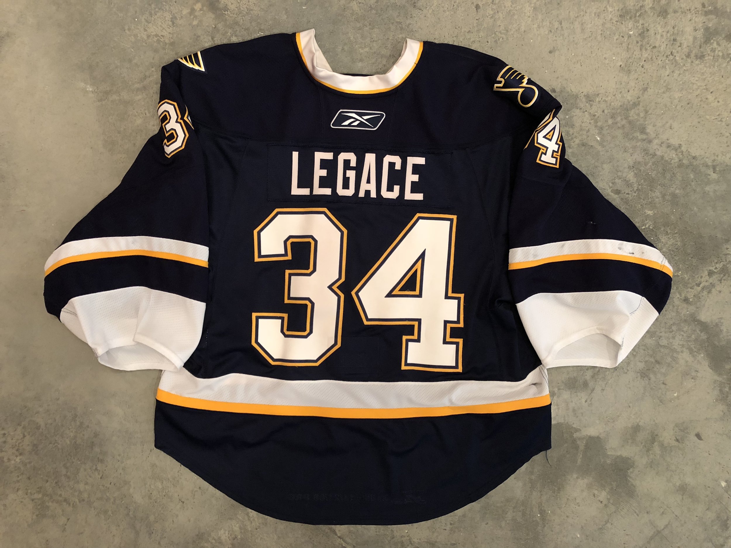 Manny Legace Blues — Game Worn Goalie Jerseys