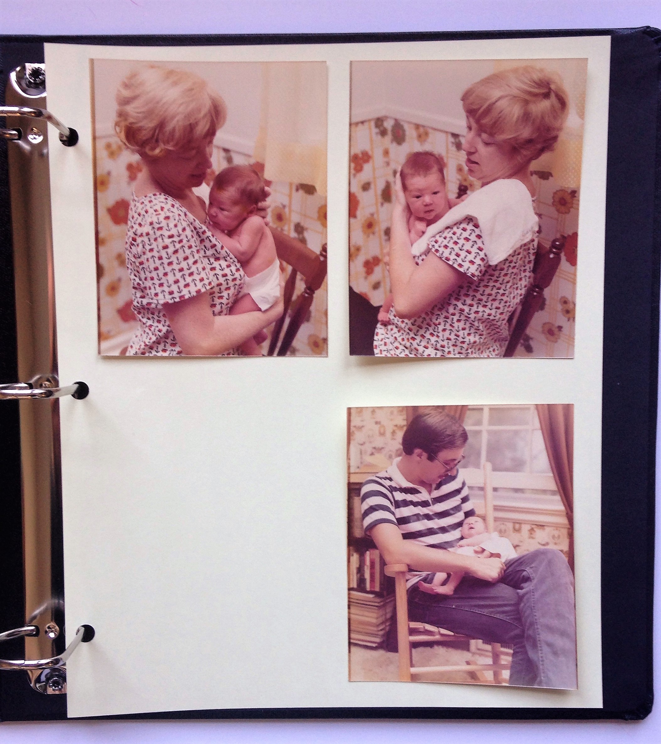 An example of a page replicated in the new archival-quality album. Once I've decided on the positioning, I would secure the images to the page with mounting corners and write the caption, "10 days old - August 28, 1977" on the page. 