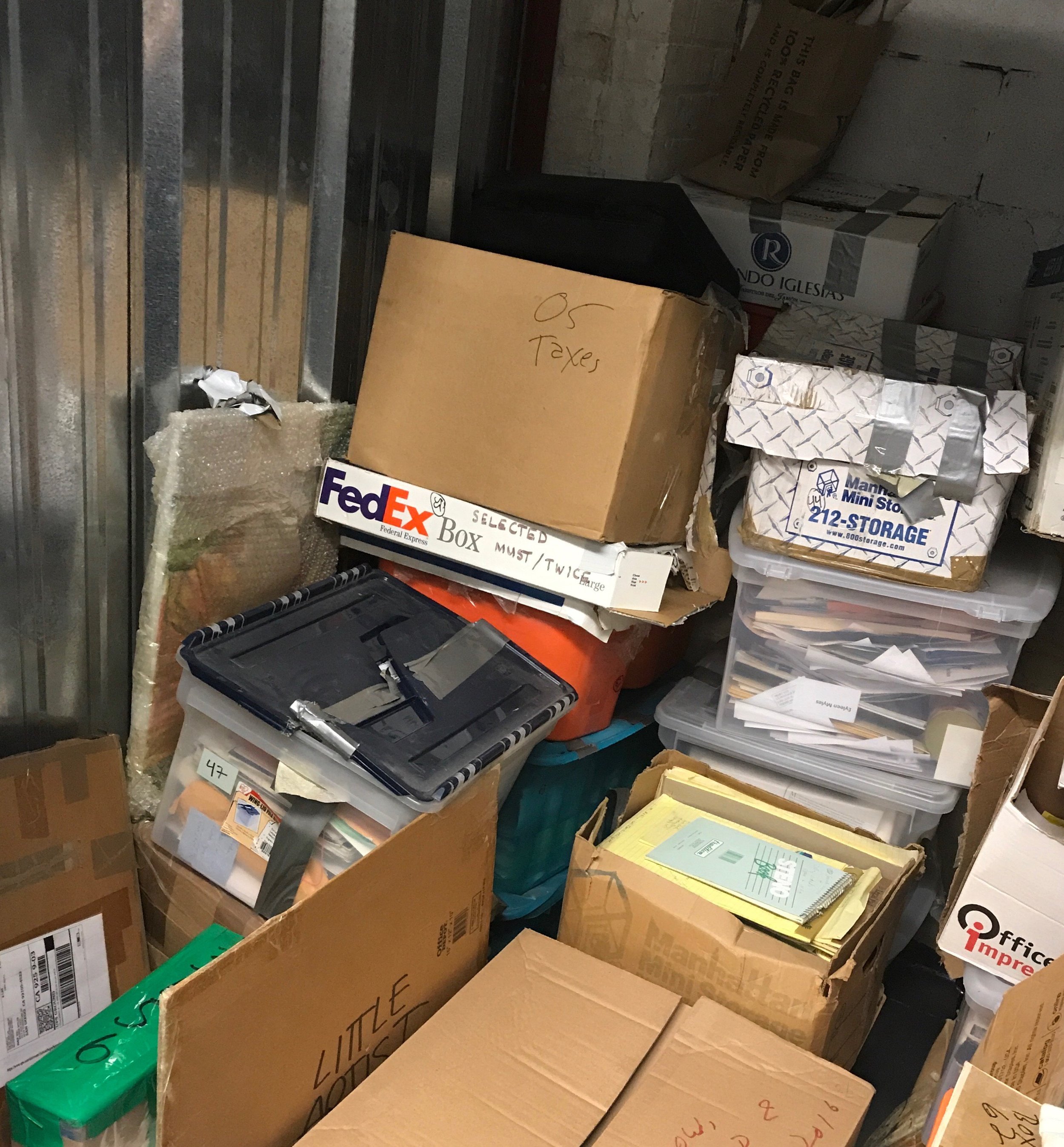 Second floor unit: boxes, bins, and bags.