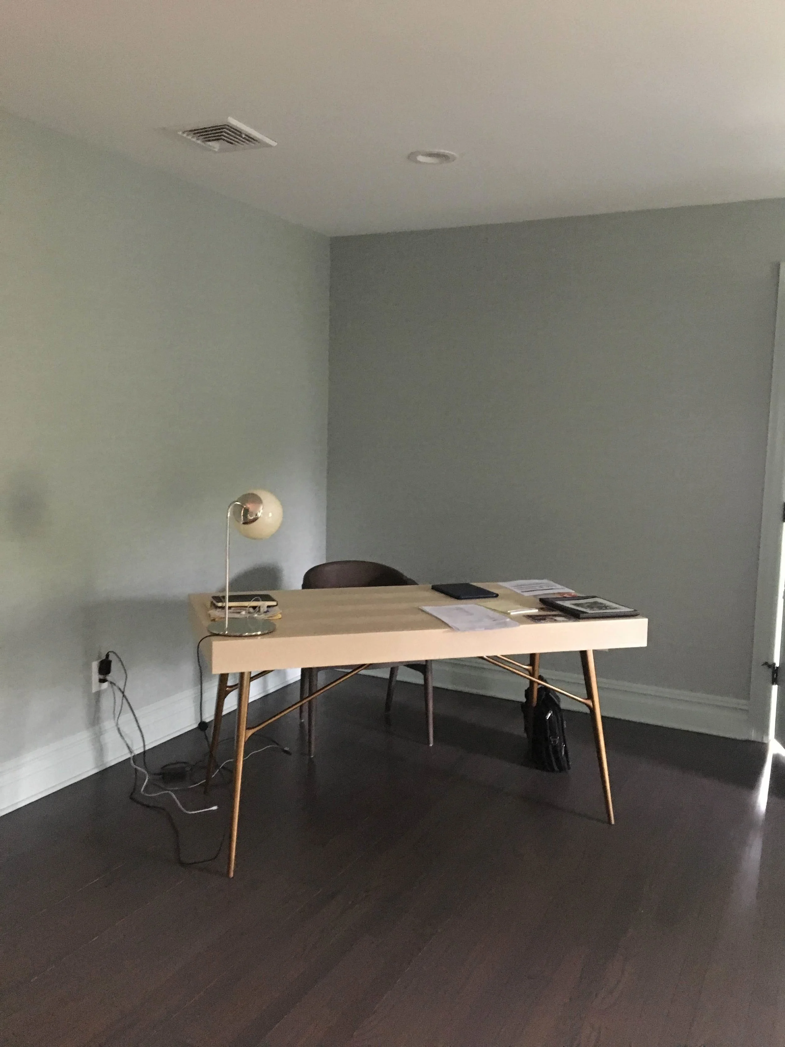 Lonely desk, soon to have new wall friends.