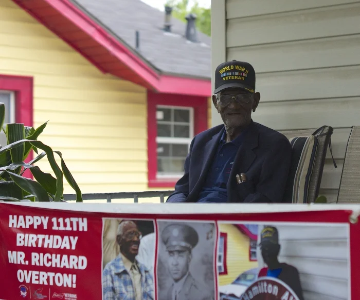 At 111 years of age, Richard Overton is America’s oldest living World War II veteran. Austin Mayor Steve Adler declared Overton's birthday, May 11, as Richard Overton Day in the city and announced that the street on which Overton lives, Hamilton Avenue, was temporarily being renamed Richard Overton Avenue. Overton, who is recovering from pneumonia, is once again a familiar sight on his front porch after a recent hospital stay. Caregivers continue to ask for donations at www.gofundme.com/Help-Richard-Overton to keep Overton living in his home instead of in a nursing home. 