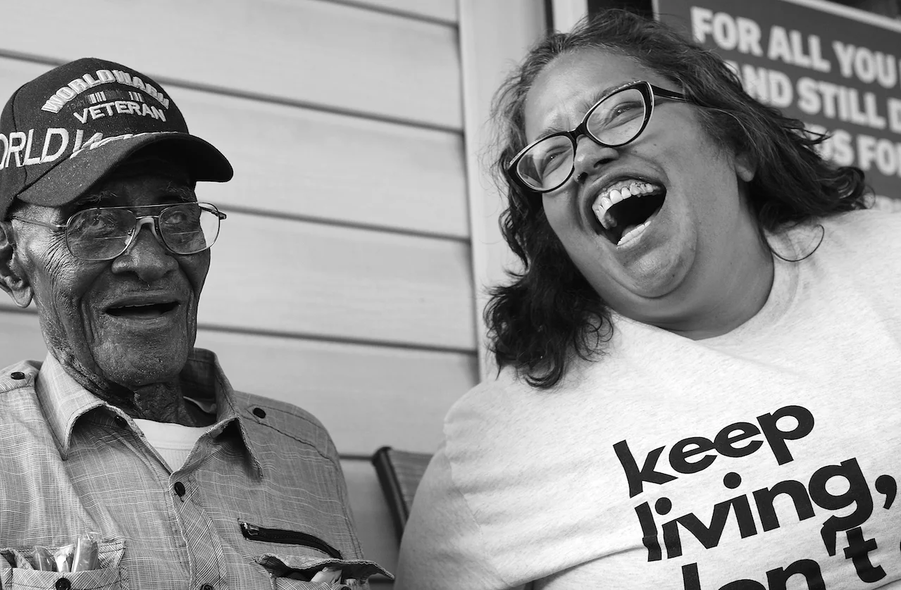 Austinites stood in line in Richard Overton’s front yard on May 11, 2018, to climb the porch steps and pose for photos with America’s oldest living World War II survivor on his 112th birthday.