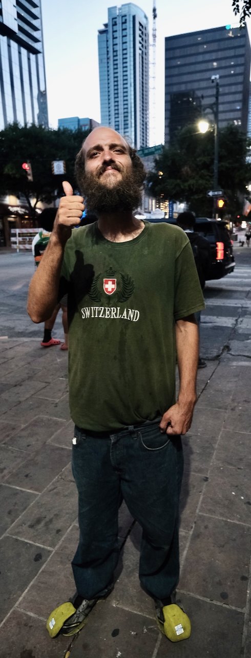 July 2024: Portrait of Derek on Sixth Street in downtown Austin, Texas.