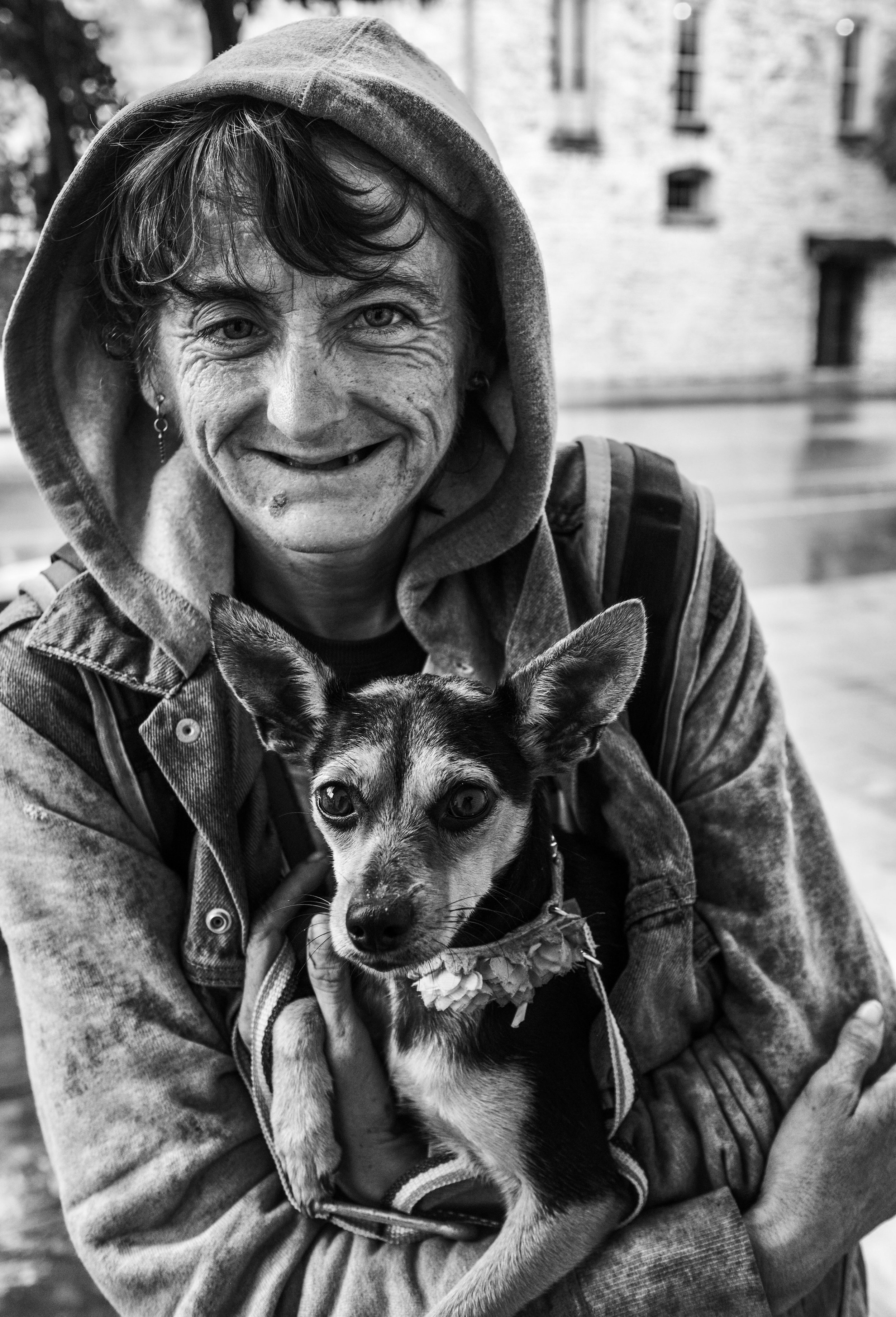 Catherine “Cat” Fako and her dog, Baby. Cat is a longtime member of the unhoused community in downtown Austin, Texas.