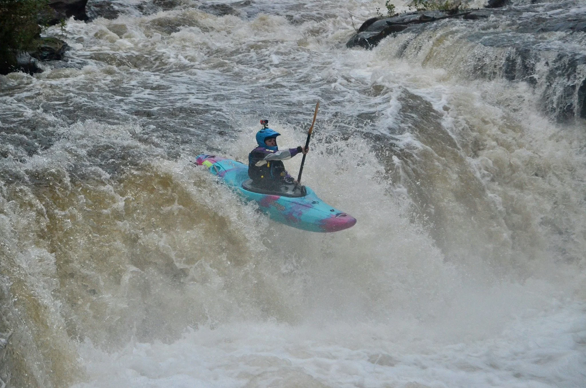 Paddler Alison Gillam, sends Rookie Drop on the Sheraton Section of the Cuyahoga River. For many paddlers, this is their first chance to run a clean drop, while working on their stroke timing. 