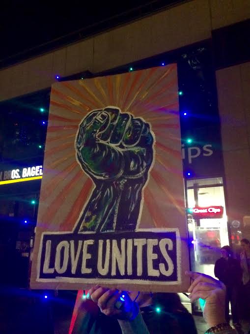 Many signs bore messages of unity and peace